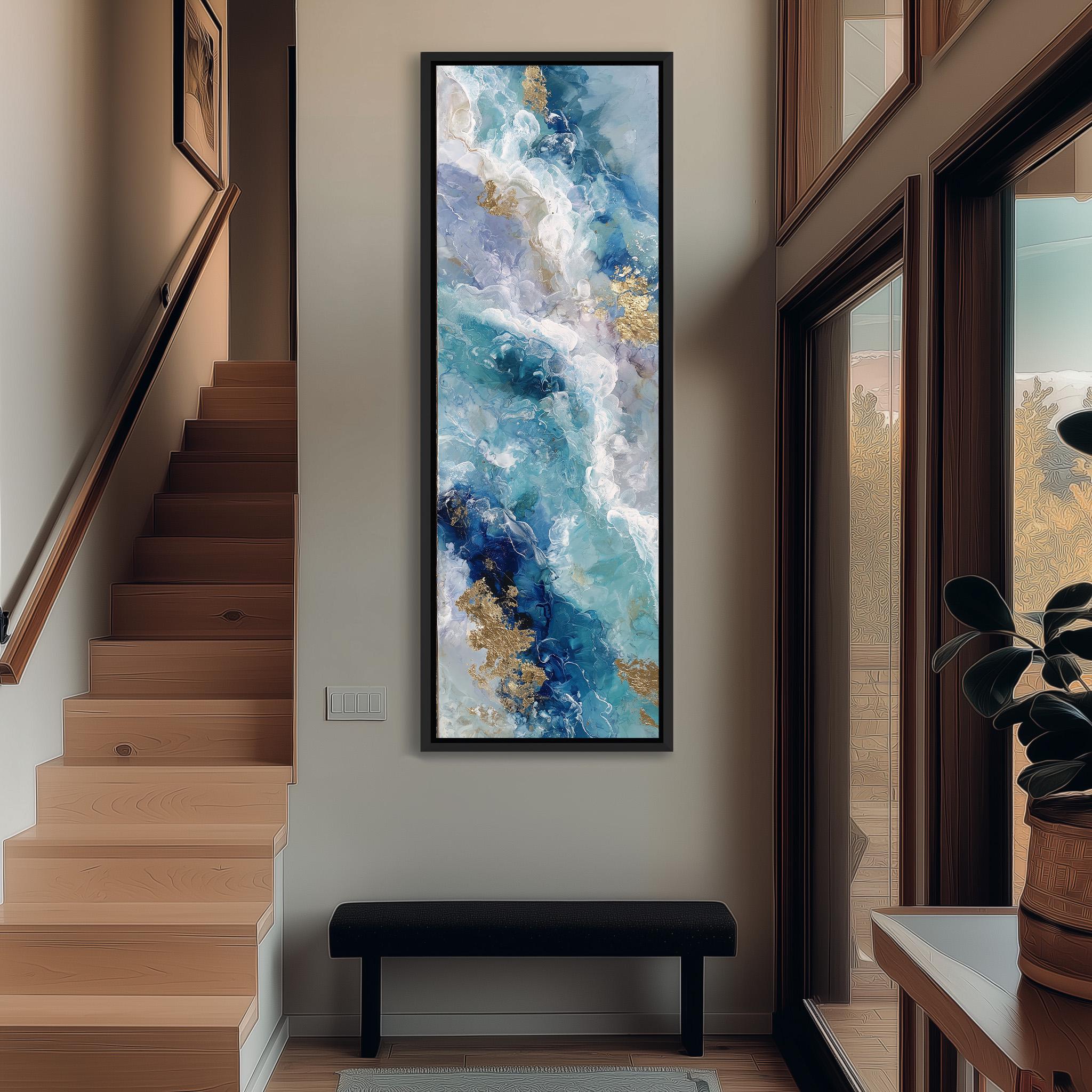 a modern interior design with a large abstract painting hanging on the wall above a black bench. The painting has a blue and white color scheme with gold accents, creating a striking contrast. The room also includes a staircase, a potted plant, and a window, contributing to the overall aesthetic and atmosphere of the space.