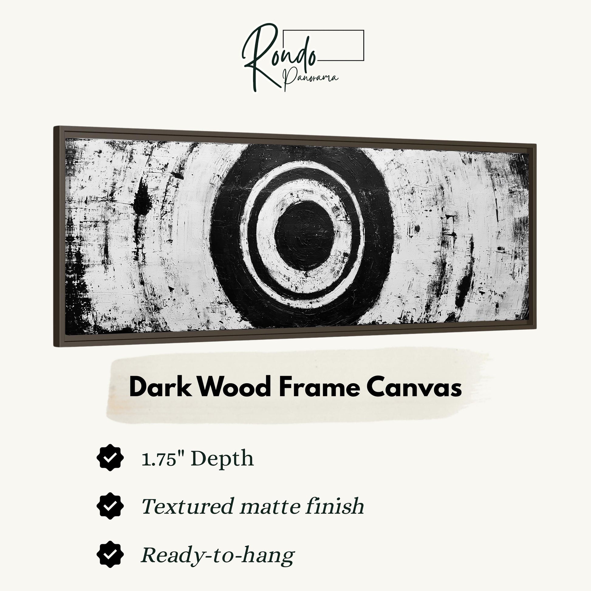The image is a dark wood frame canvas with a black and white abstract design.