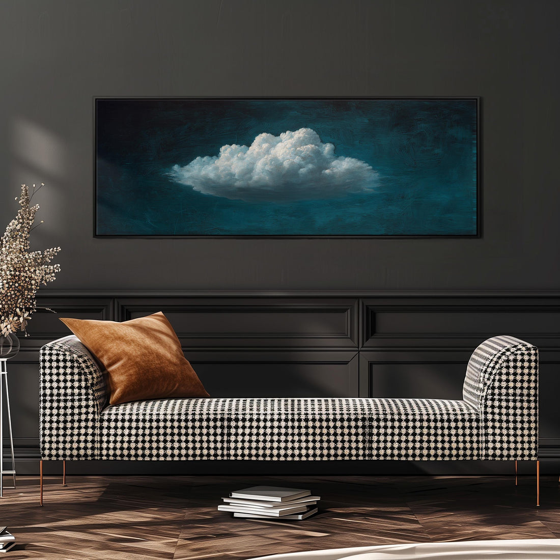 a black and white checkered sofa with a brown throw pillow, set against a dark wall with a framed painting of a cloud above it.