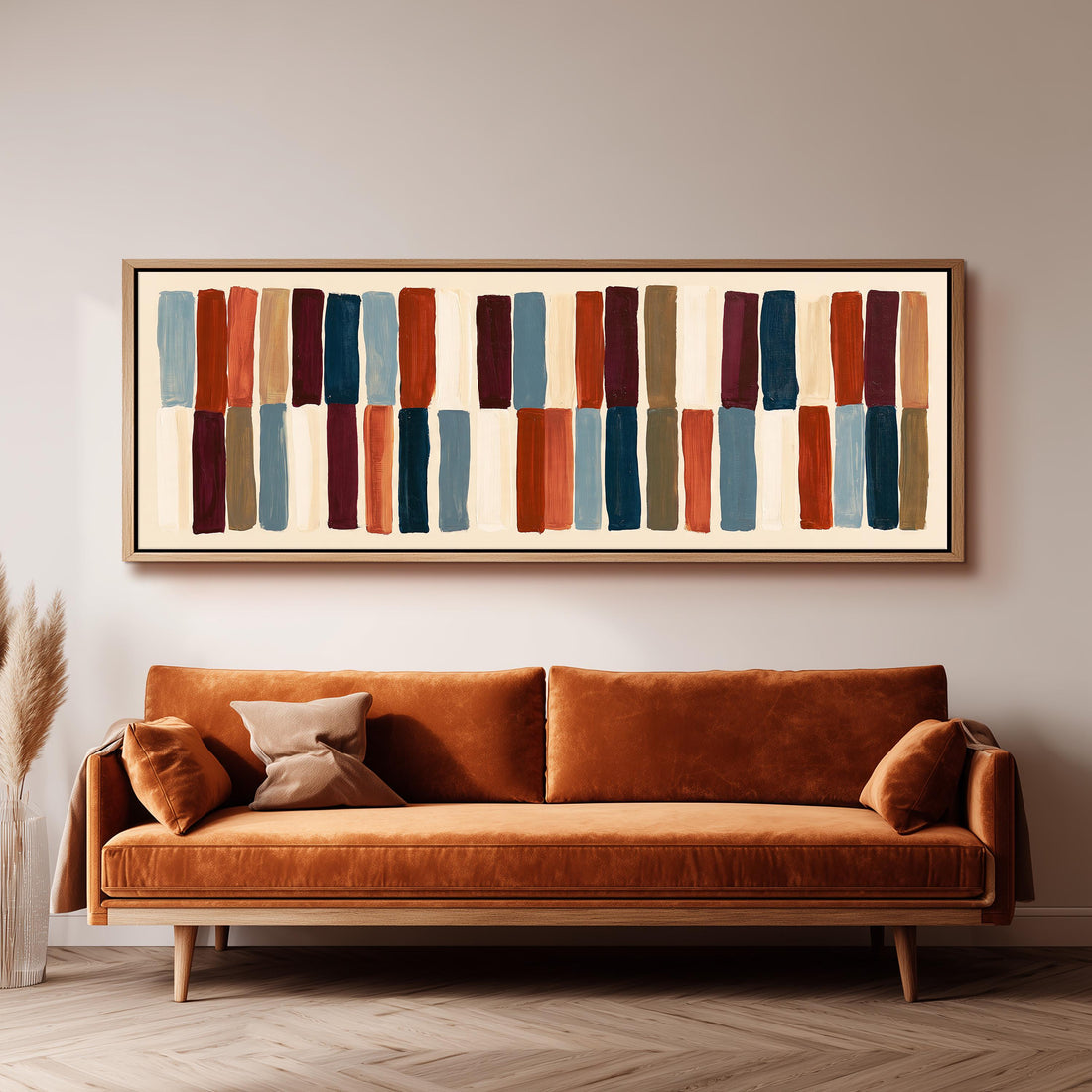 Two tiers of staggered stripe blocks long horizontal canvas print above a sofa in a living room