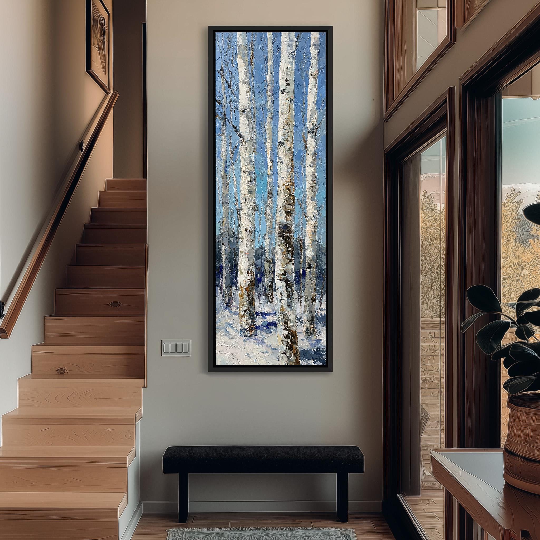 a hallway with a large painting of a snowy forest hanging on the wall. The painting is framed and appears to be a landscape artwork. The hallway has a wooden staircase and a bench, creating a cozy and inviting atmosphere.