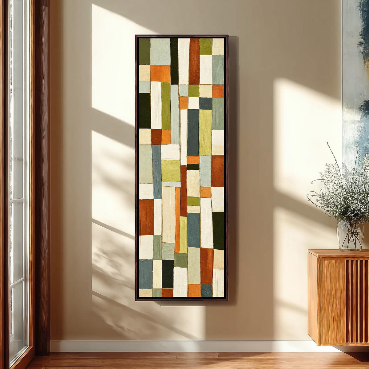 Muted sage, terracotta and cream block grid tall skinny canvas print in a sunlit living space