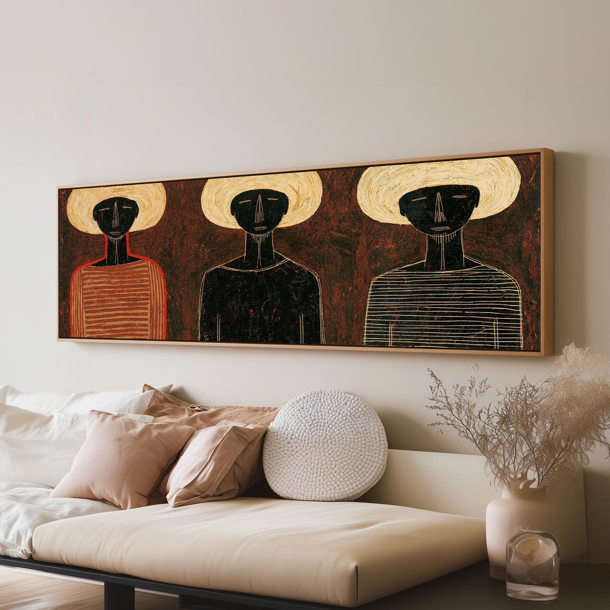 Three figures in striped shirts panoramic canvas print above a sofa in a living room