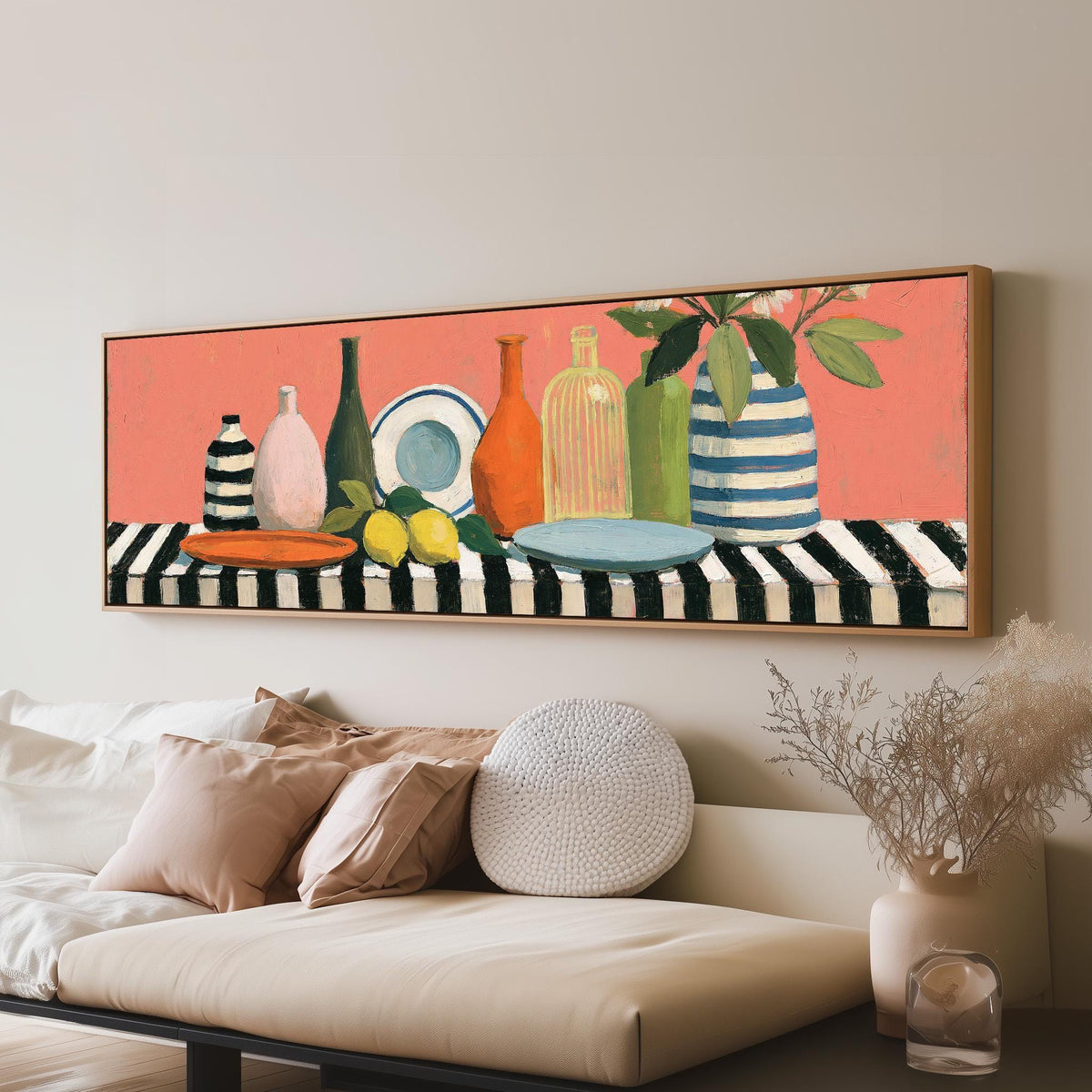 Bottles and lemons still life panoramic canvas print above a sofa in a living room