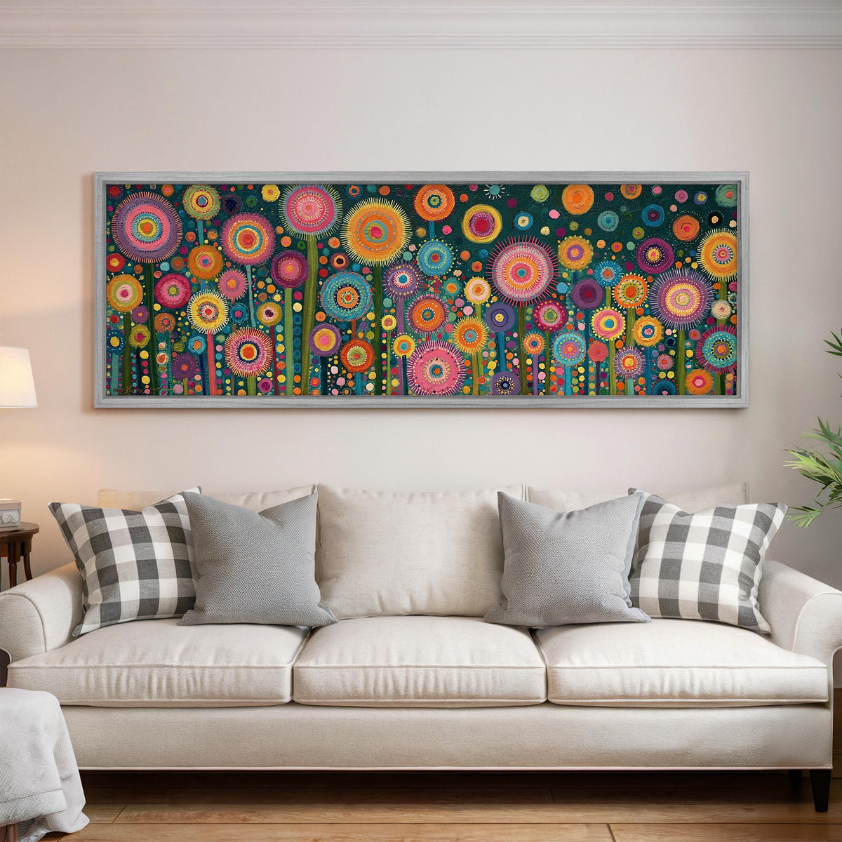 Circle flower garden on teal panoramic canvas print above a white sofa in a bright living room