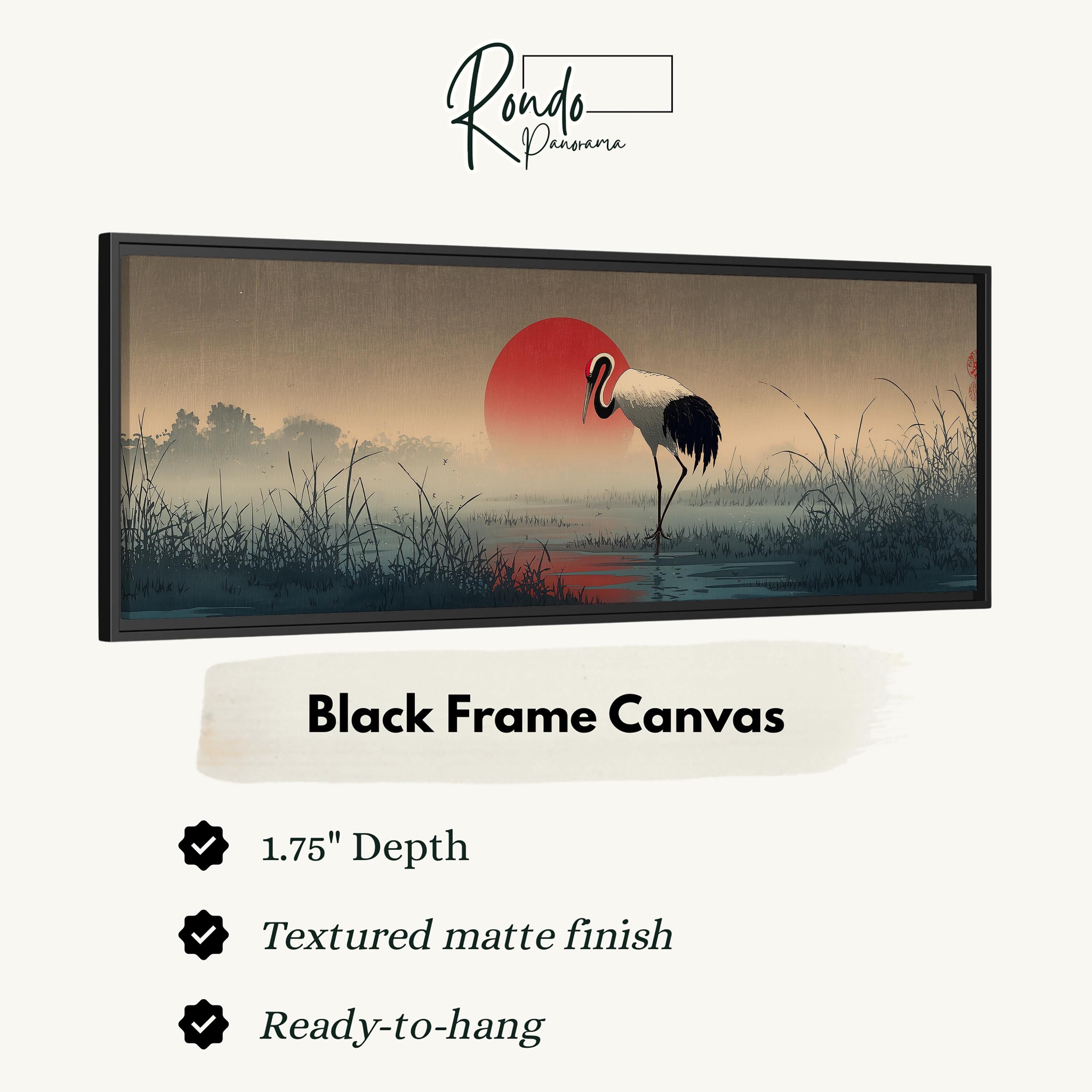 The image is a black frame canvas depicting a serene landscape with a crane standing in a field near a body of water, possibly a lake or pond, with a red sun in the background.