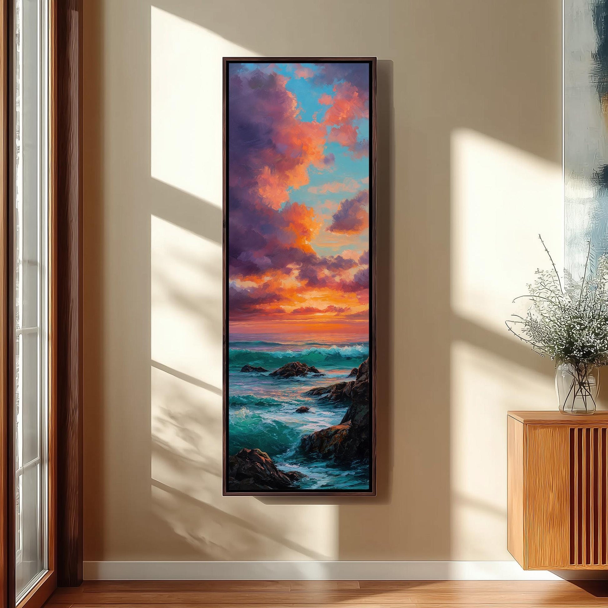 a large framed painting of a seascape with a colorful sunset over the ocean.