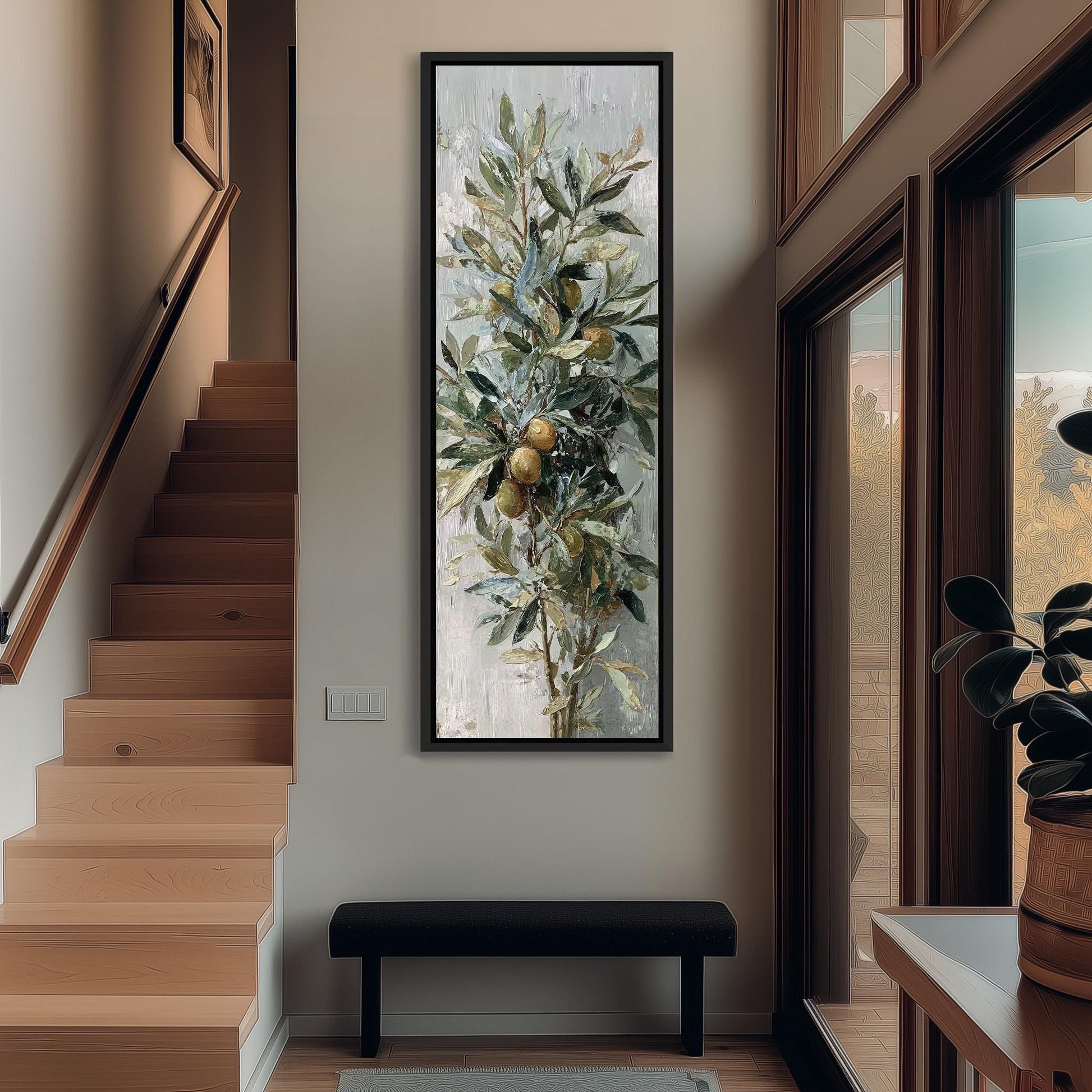 a large painting of a tree with green leaves and yellow fruit hanging on the wall of a hallway. The painting is framed and appears to be the focal point of the space.
