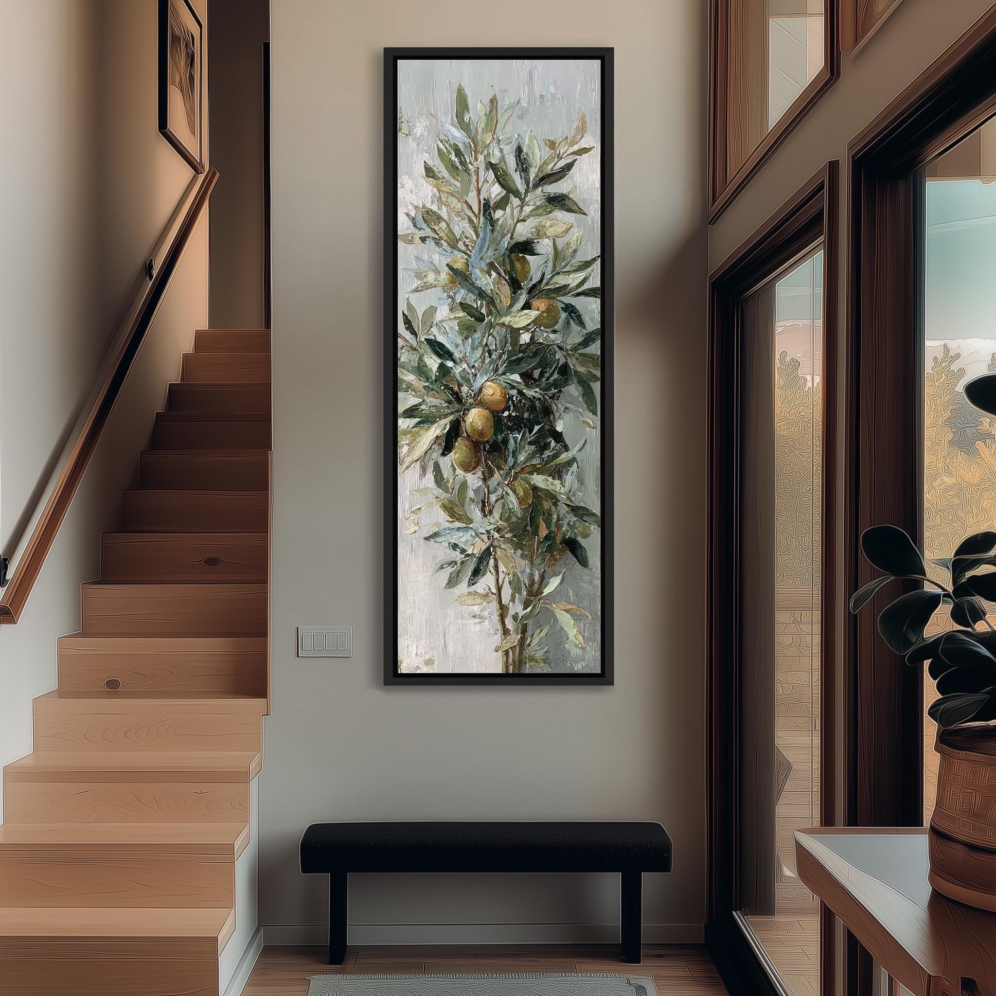 a large painting of a tree with green leaves and yellow fruit hanging on the wall of a hallway. The painting is framed and appears to be the focal point of the space.