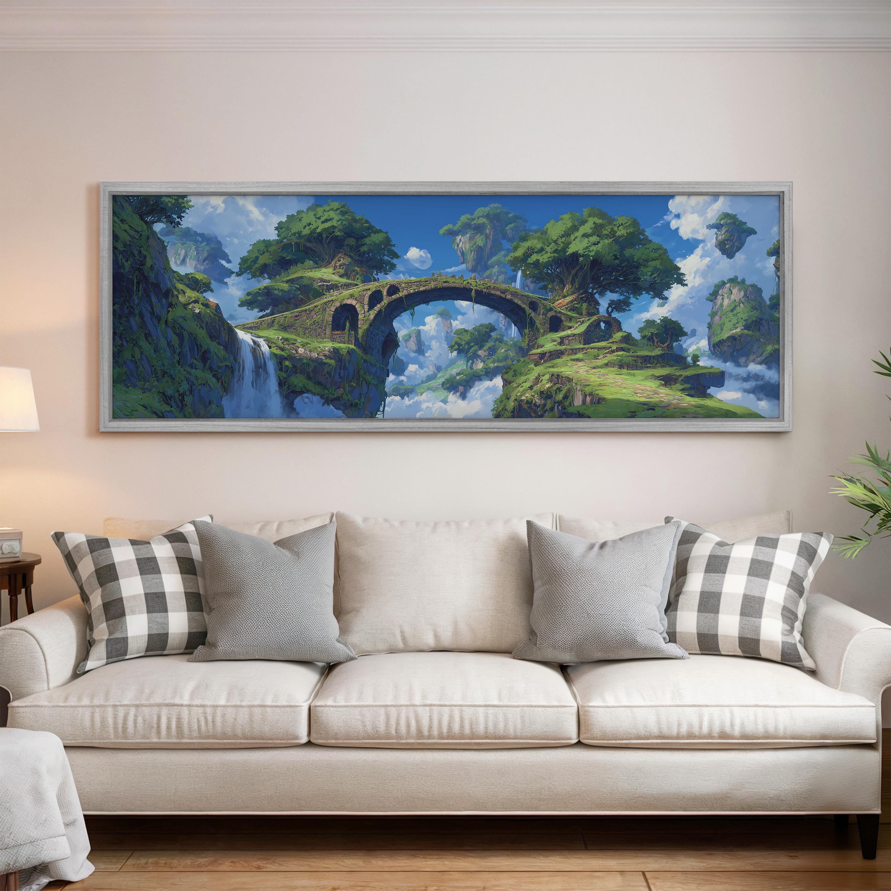 a large, framed painting of a fantastical landscape with a bridge, trees, and a waterfall. The painting is hung on a wall above a white couch with decorative pillows.