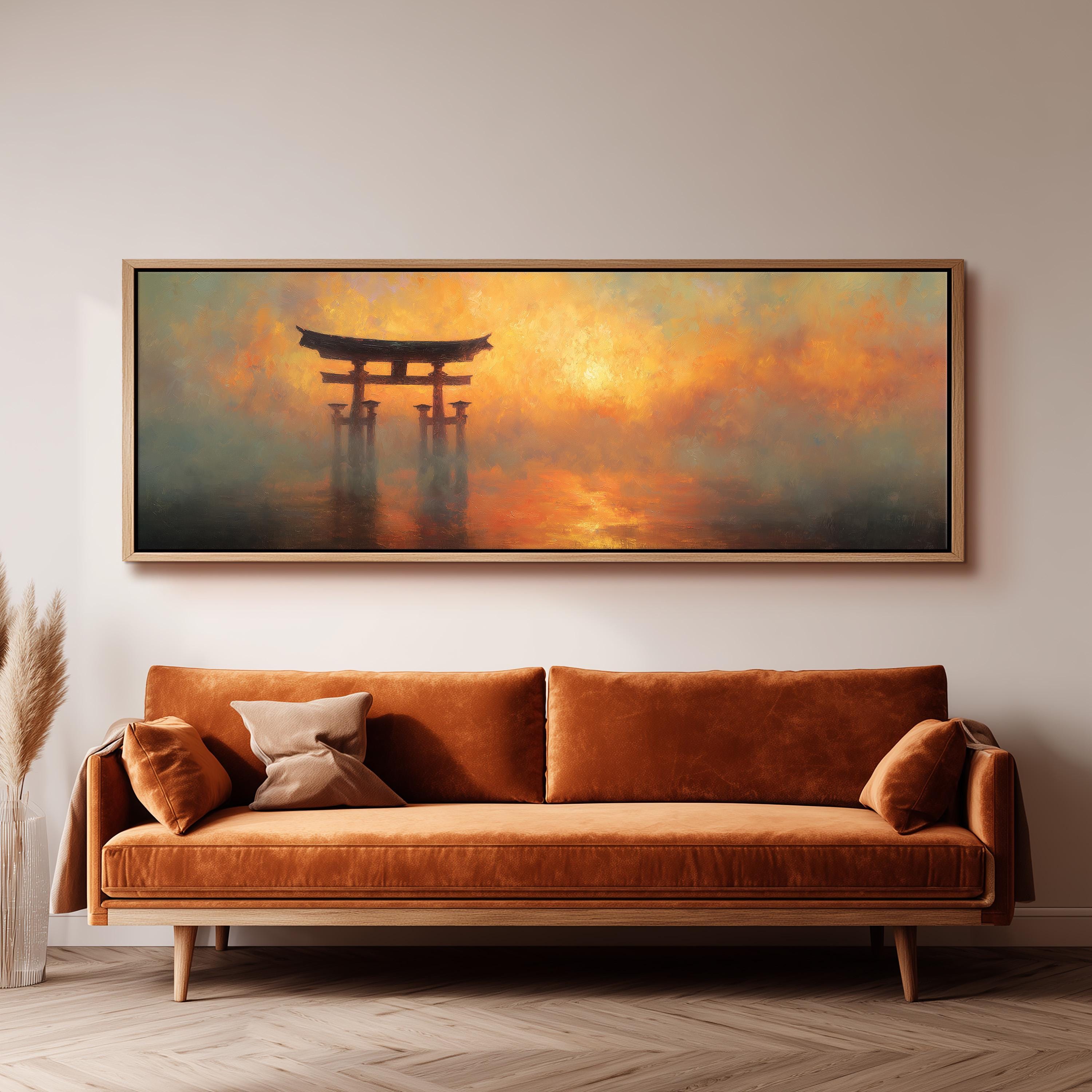 a large painting of a torii gate in a misty landscape, hanging on a wall above a brown sofa.