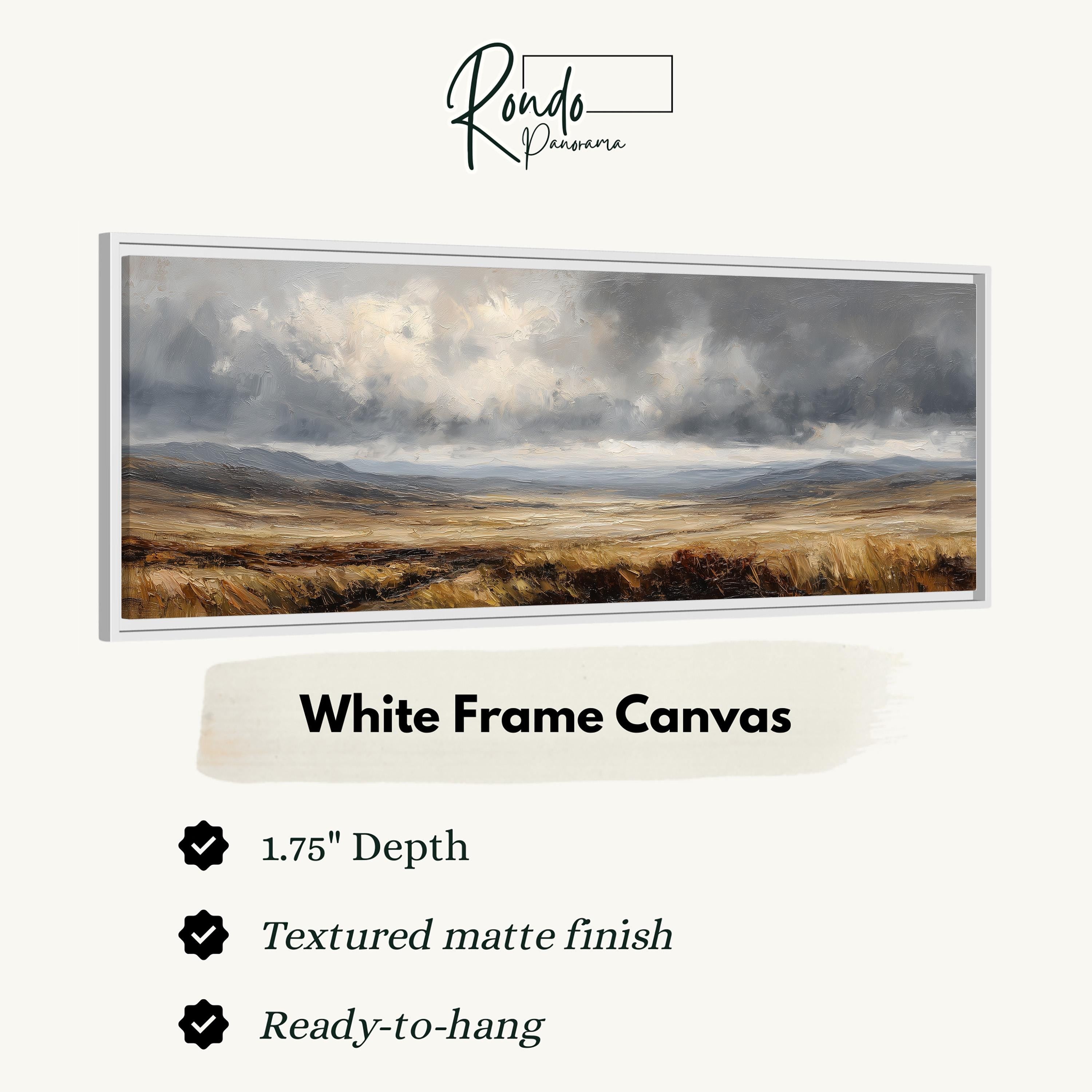 The image is a white frame canvas depicting a landscape with a cloudy sky and a field of grass.