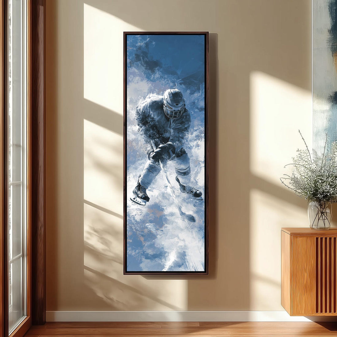 a large framed painting of a person skiing in the air, hanging on a wall in a modern kitchen.