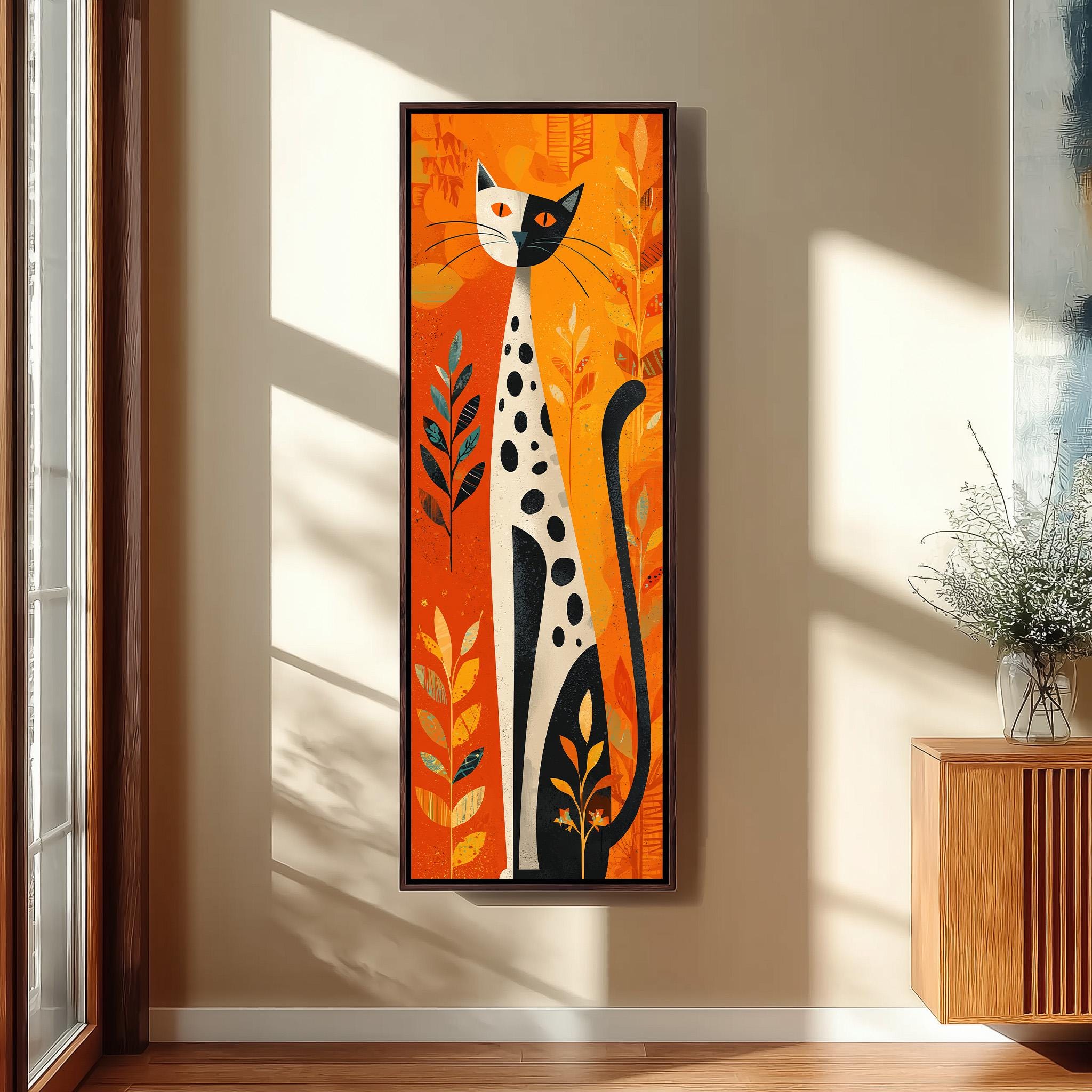 a large, colorful painting of a cat with a predominantly orange and black color scheme, hanging on a wall in a room with a wooden cabinet and a vase of flowers.