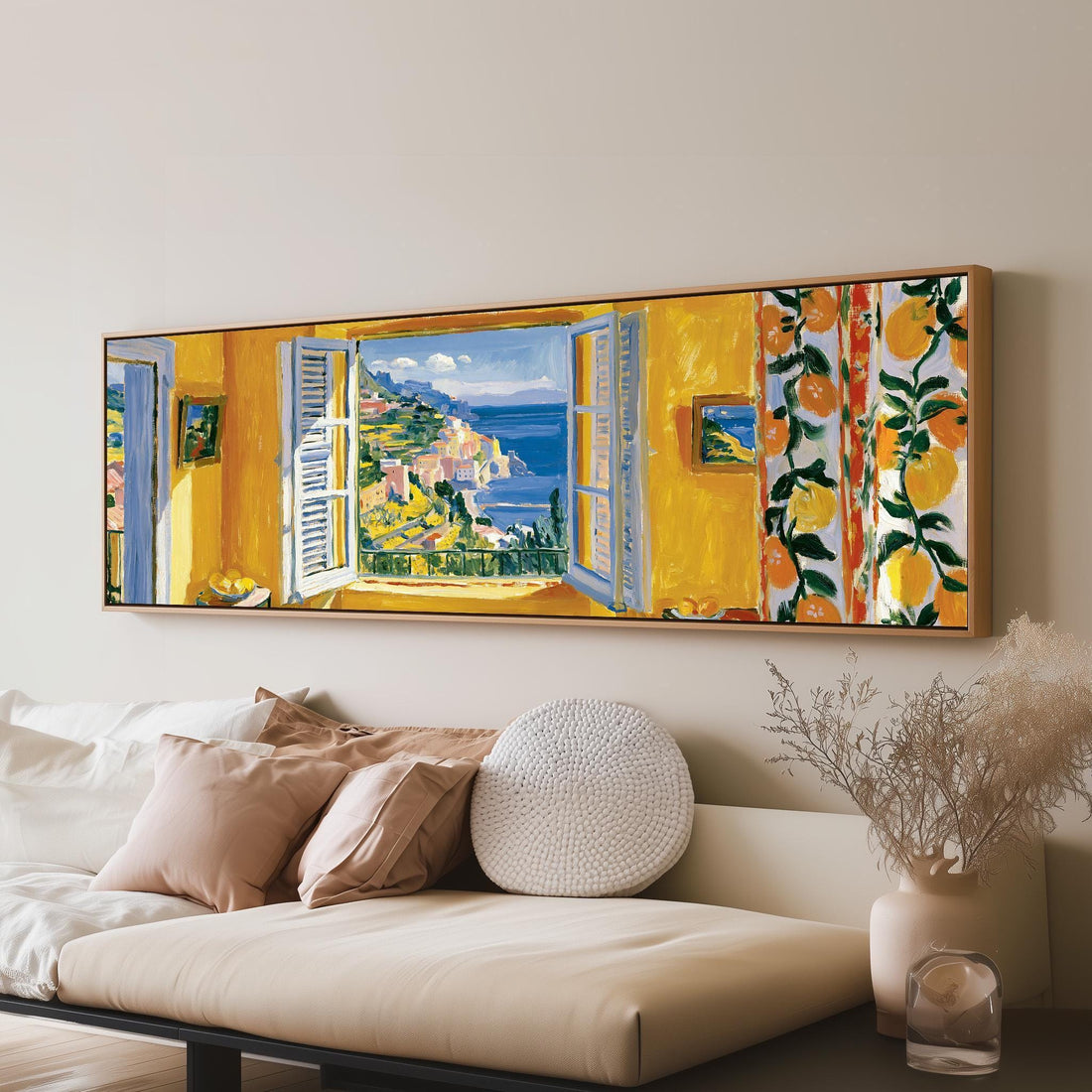 Amalfi Coast through a lemon-patterned window long horizontal canvas print above a sofa in a living room