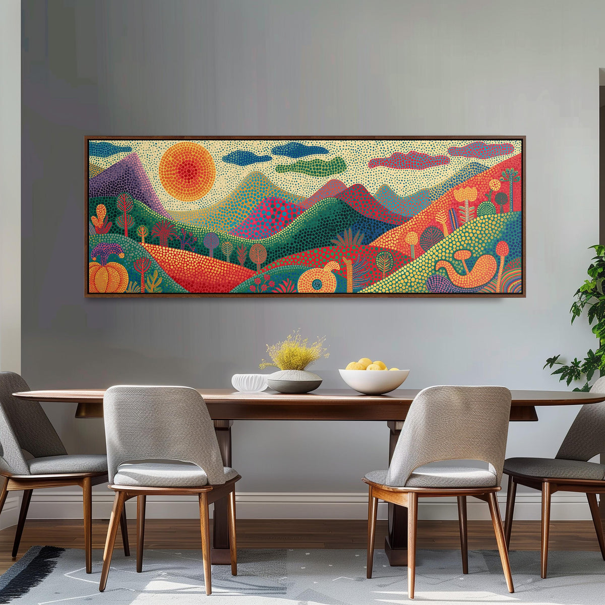 Dotted mountains under a sunburst long horizontal canvas print above a dining table