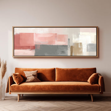 a large, rectangular abstract painting hanging on a wall above a brown sofa with two pillows.