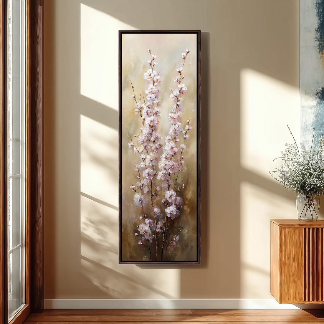 a serene and cozy bedroom scene, featuring a large floral painting hanging on the wall, a white bed with a white pillow, a white vase with tall potted plants, and a woven ottoman.