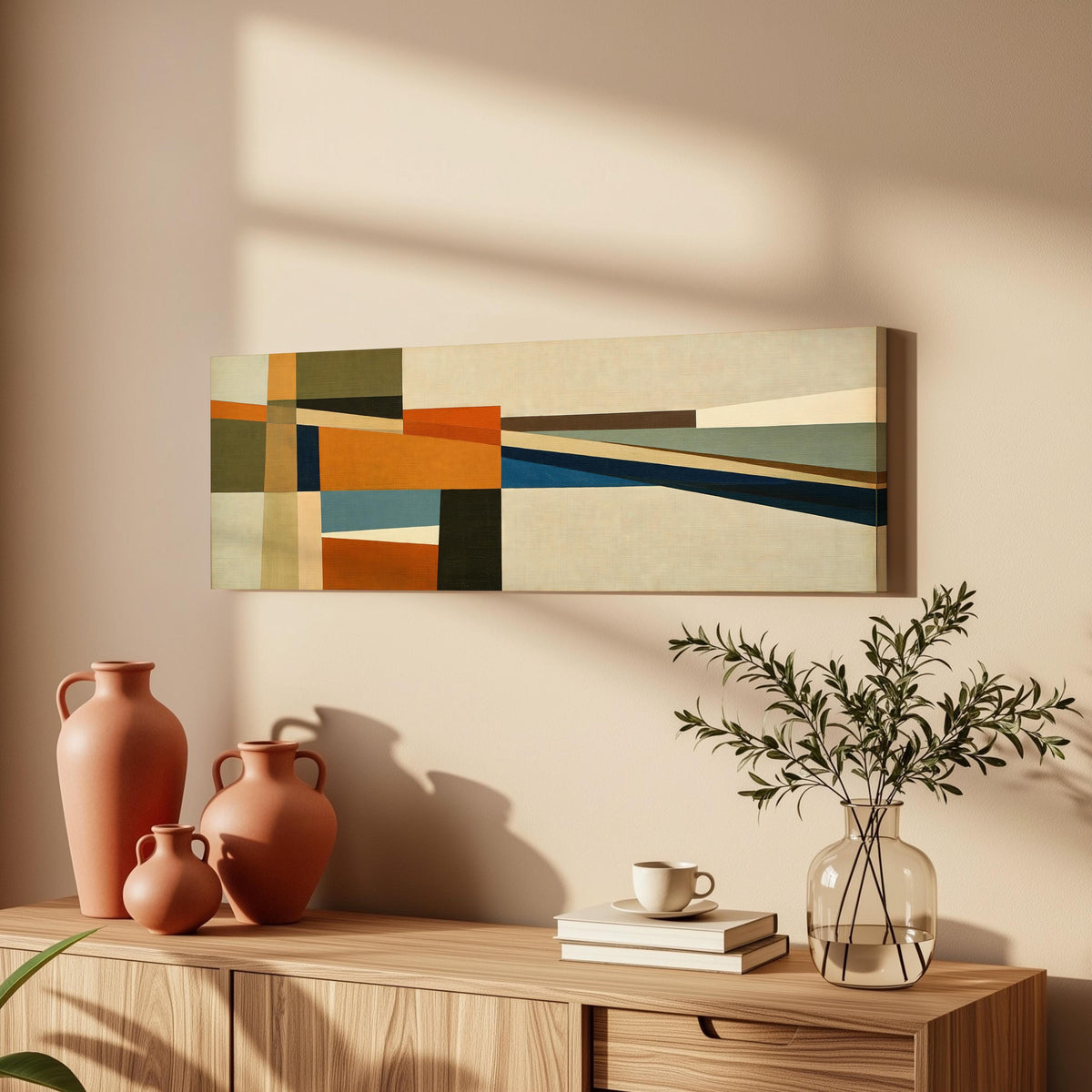 Olive and rust geometric blocks long horizontal canvas print above a wooden sideboard