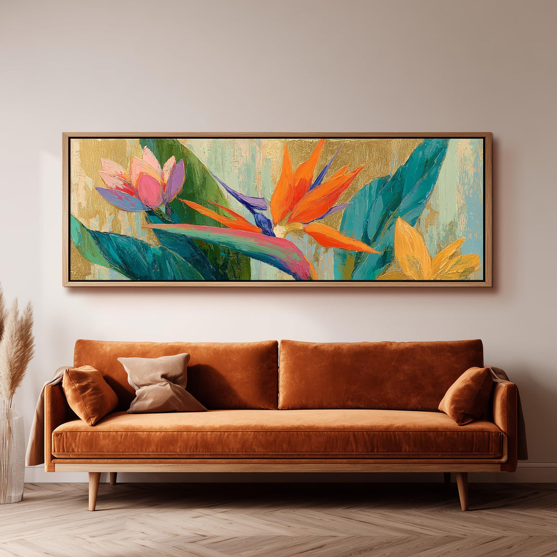 a large, colorful painting of tropical flowers hanging on a wall above a brown sofa.