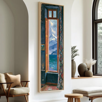 Snowy mountain and sea seen through a tall window long vertical canvas print in a sunlit living space