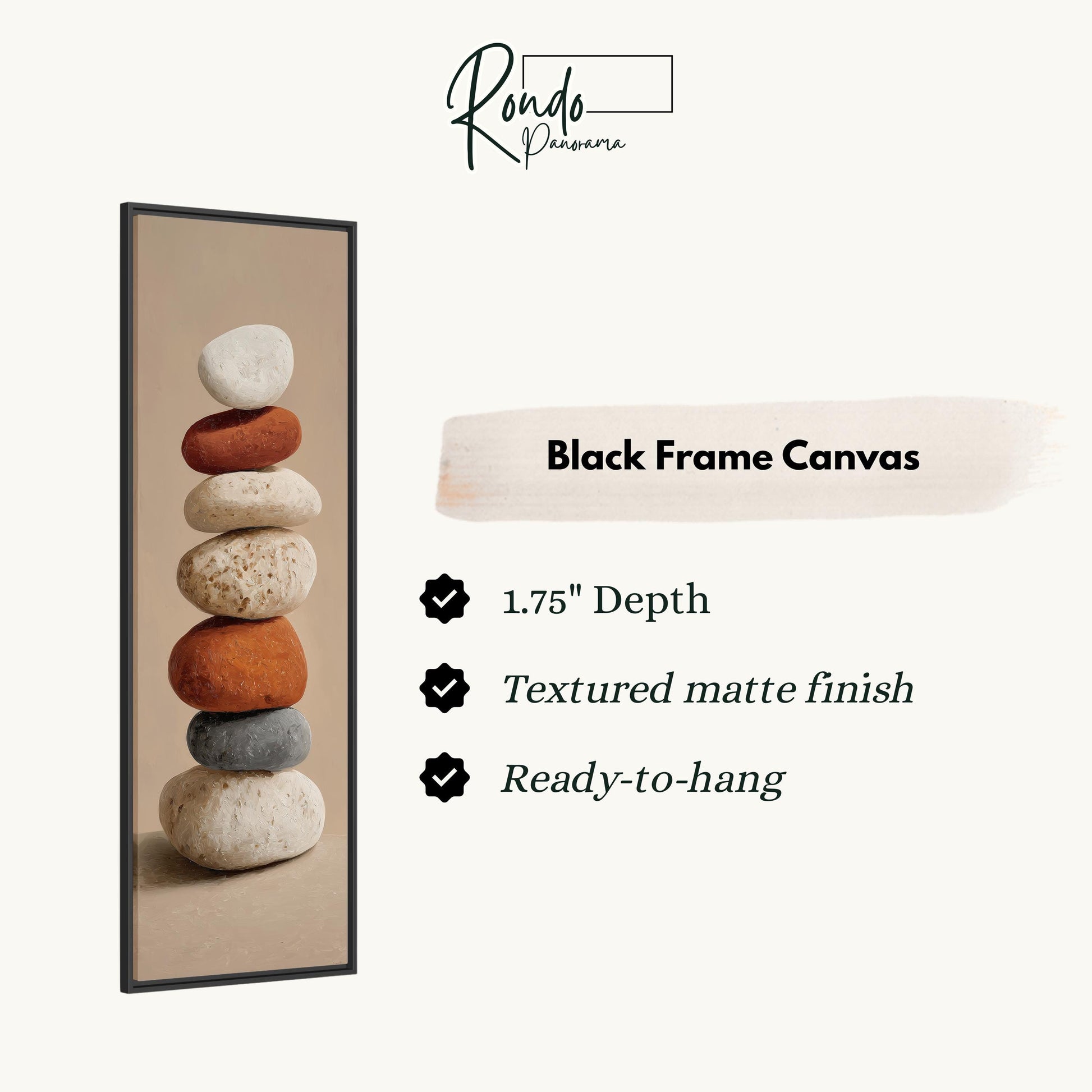 a black frame canvas with a stack of rocks on top of it.