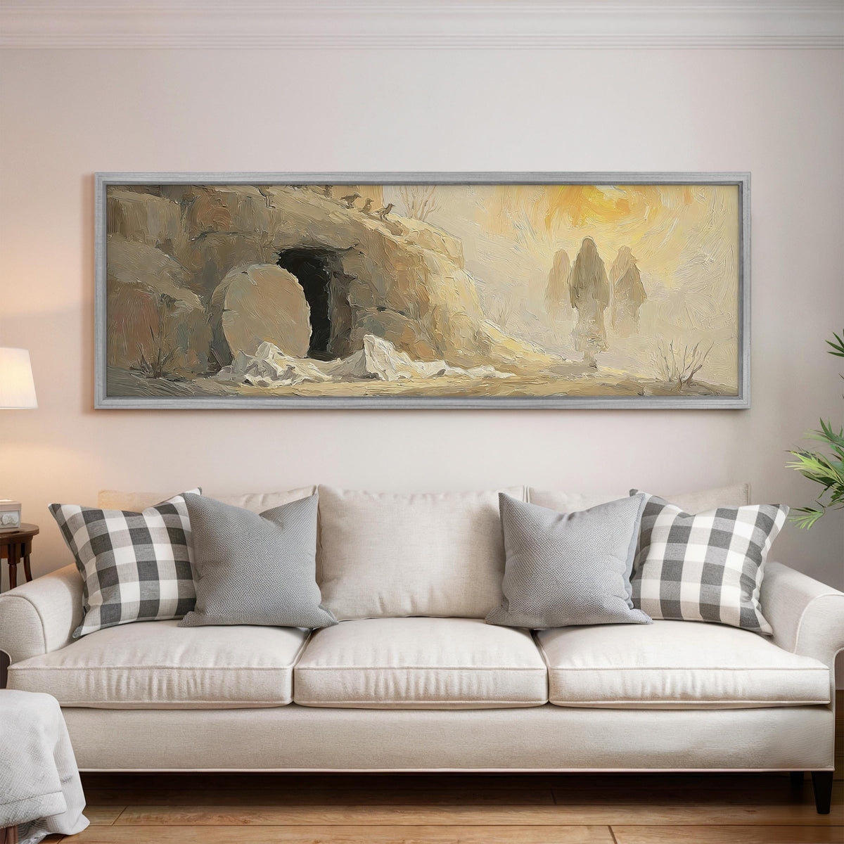 The empty tomb at sunrise panoramic canvas print above a white sofa in a bright living room
