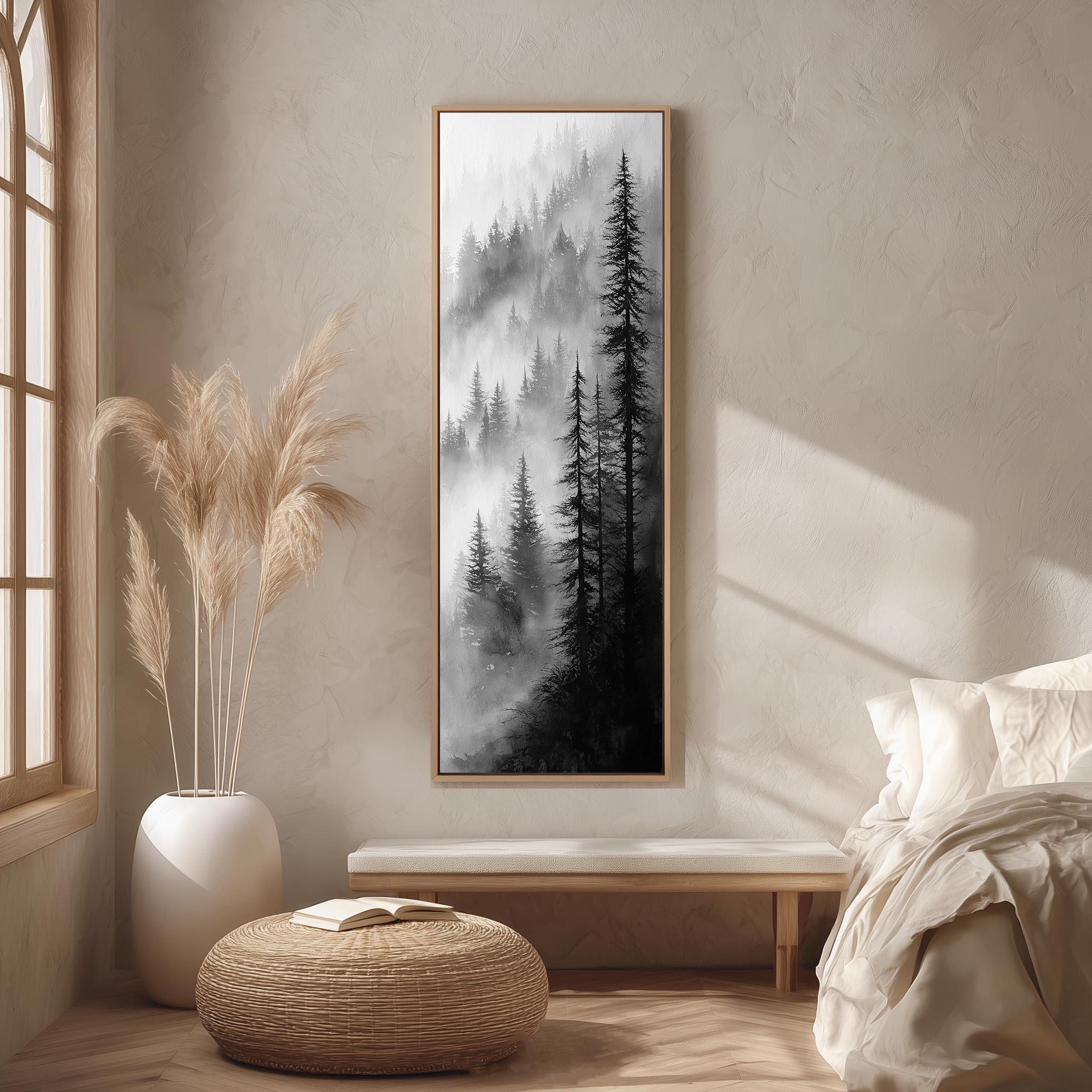 a serene bedroom scene with a large framed black and white landscape painting hanging on the wall, a white bed with a white pillow, a white wicker ottoman, and a large window with a plant on the sill.