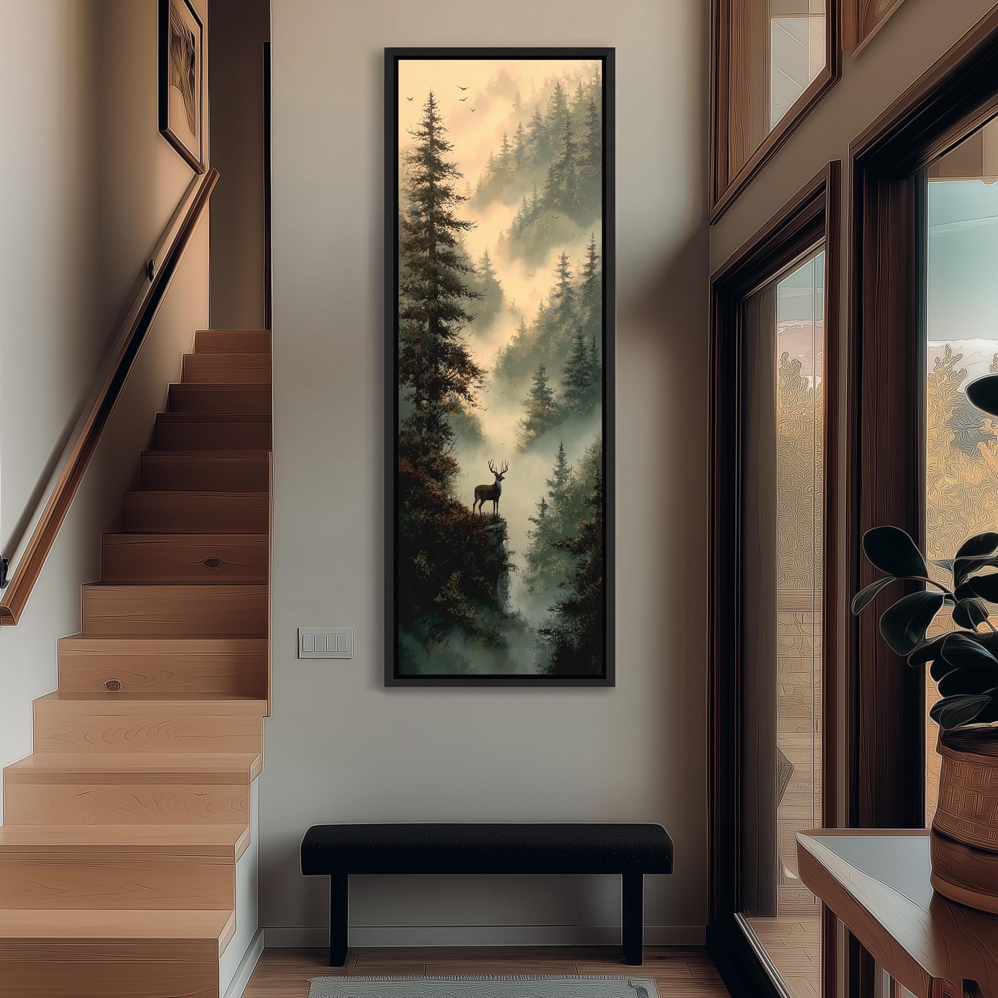 a hallway with a large painting of a deer standing on a cliff overlooking a misty forest. The painting is framed and hangs on the wall above a bench. The hallway has wooden stairs leading up to the painting, and there is a plant on the right side of the image.