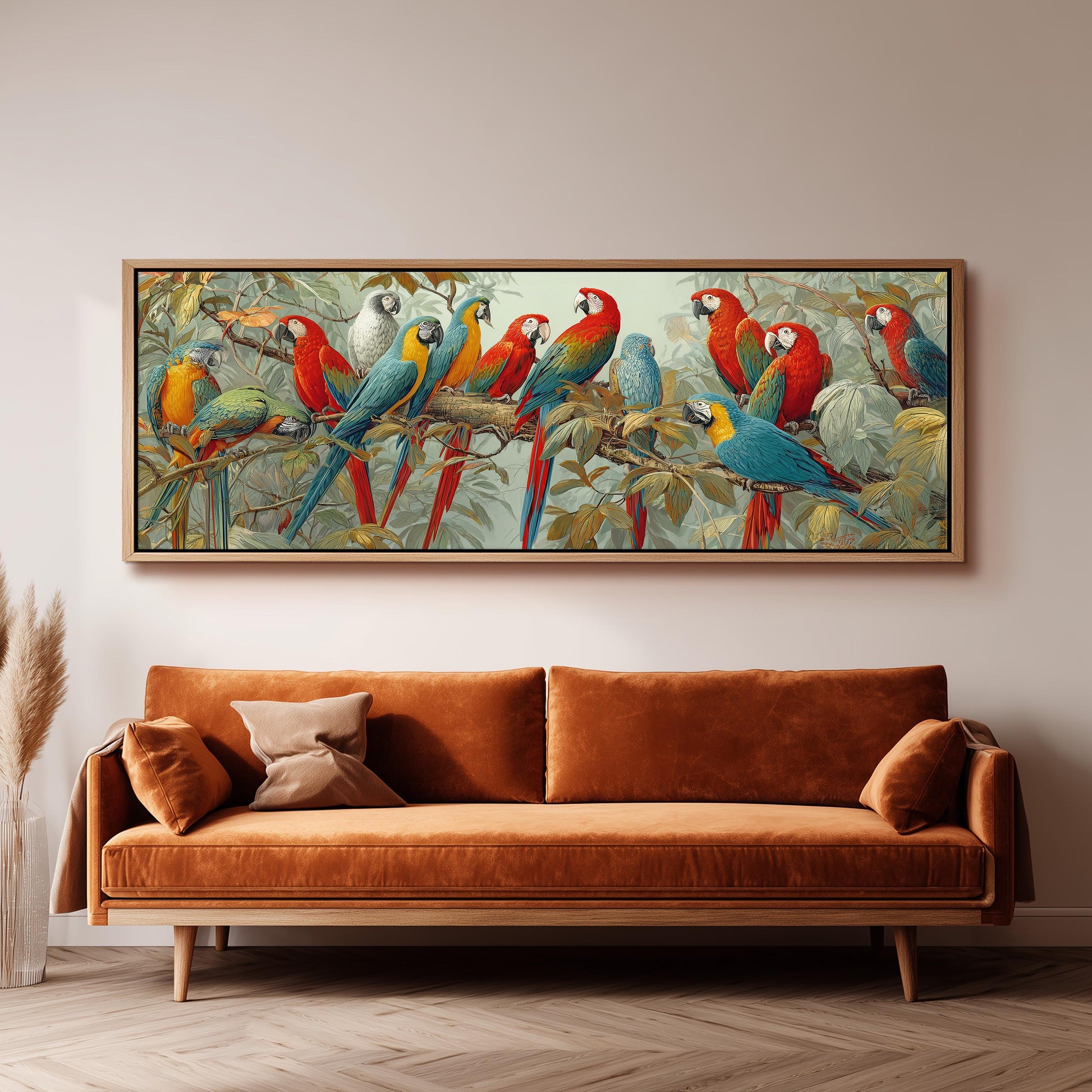 a large, colorful painting of a group of parrots perched on branches, hanging on a wall above a brown sofa.