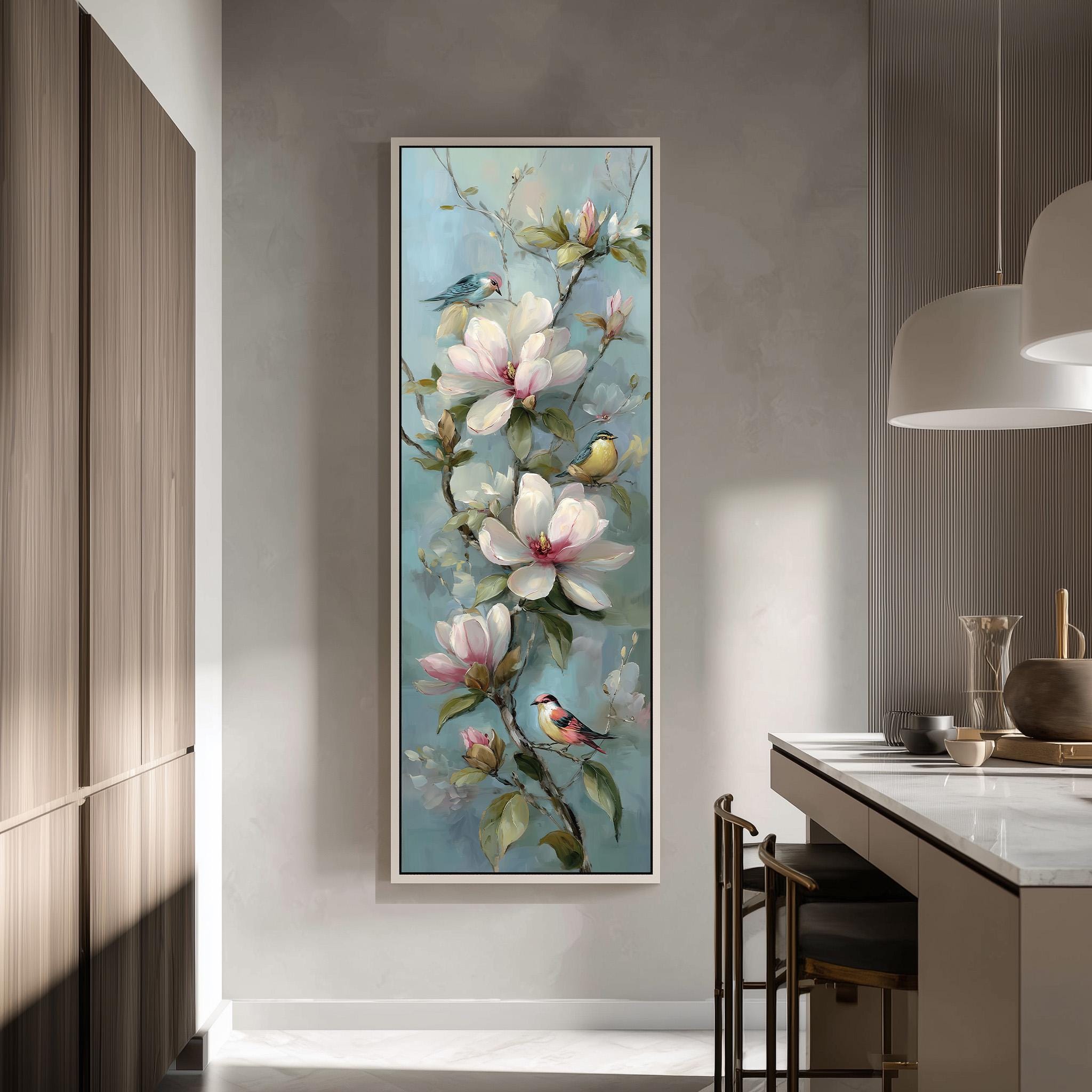 a large painting of a flower-filled branch hanging on a wall, with birds perched on the branches.