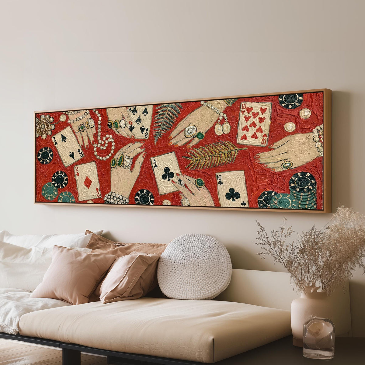 Playing cards, chips and jeweled hands panoramic canvas print above a sofa in a living room