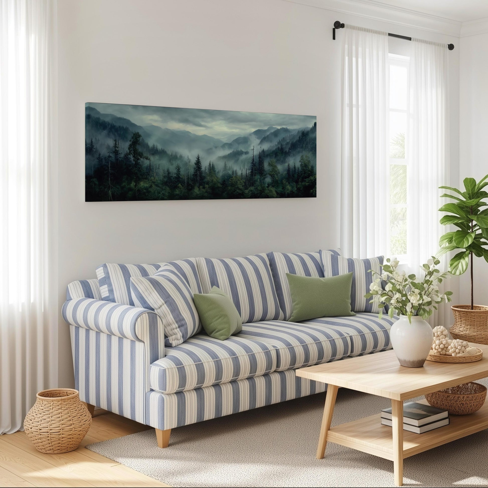 a cozy living room with a striped sofa, a coffee table, and a large landscape painting hanging on the wall.