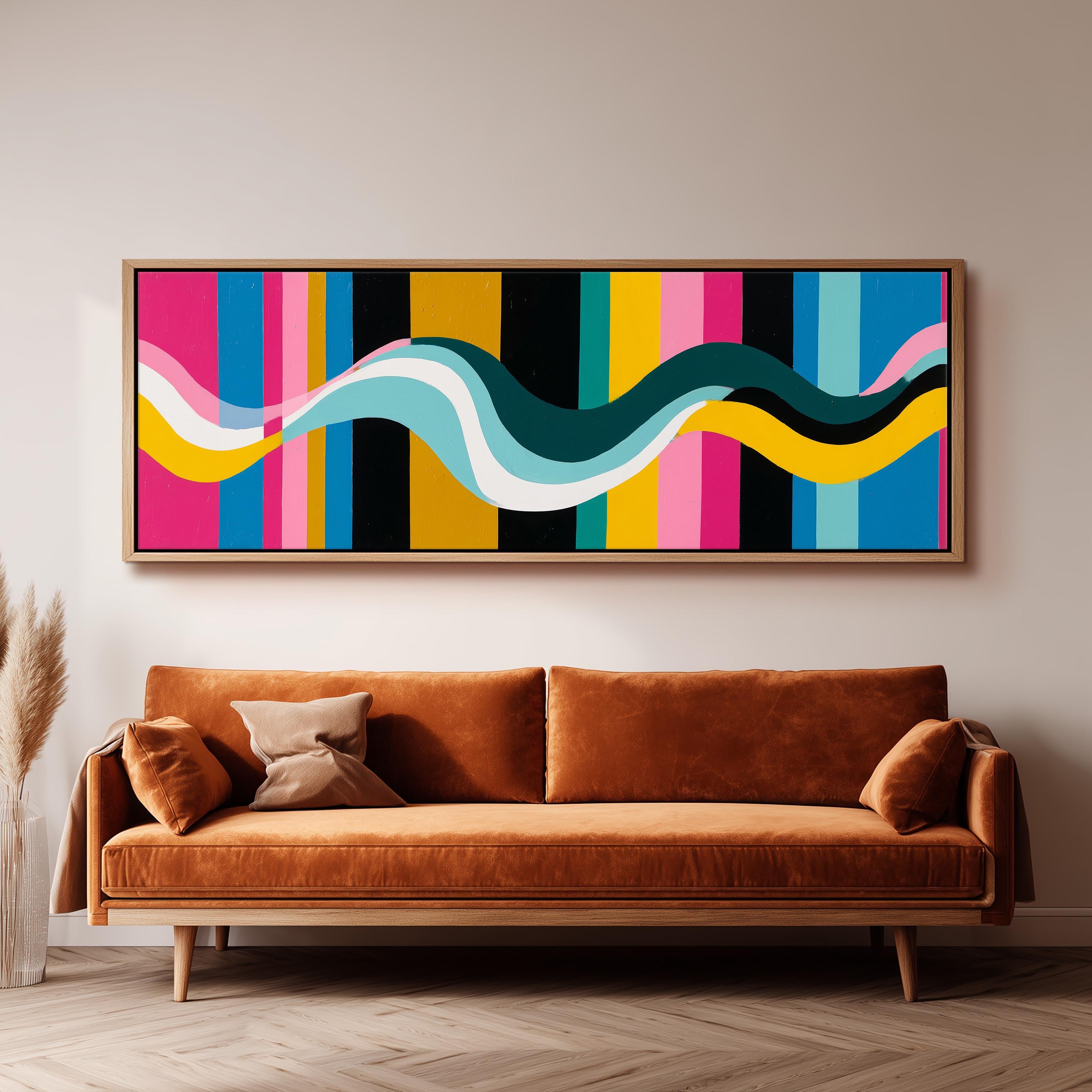 a large abstract painting hanging on a wall above a brown sofa with two pillows.