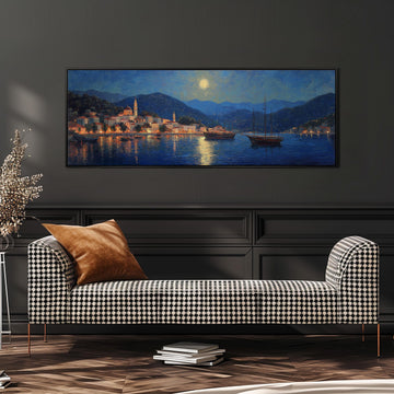a large painting of a coastal town at night, with boats on the water and a moonlit sky. The painting is hung on a wall above a black and white checkered sofa, which is positioned in front of a stack of books.