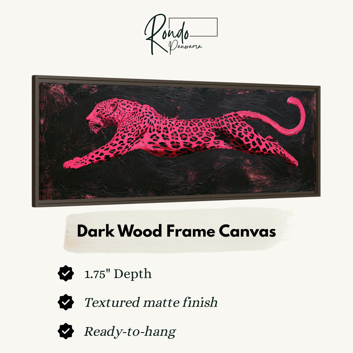 Pink leaping leopard canvas print in a dark wood floating frame