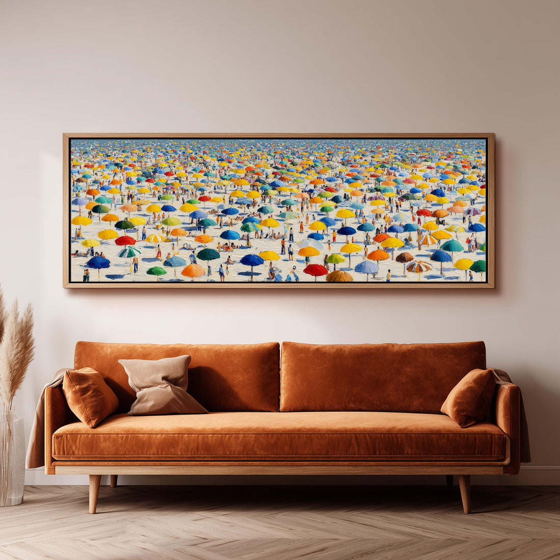 a large, colorful painting of a beach scene with numerous umbrellas and people enjoying the sunny day.