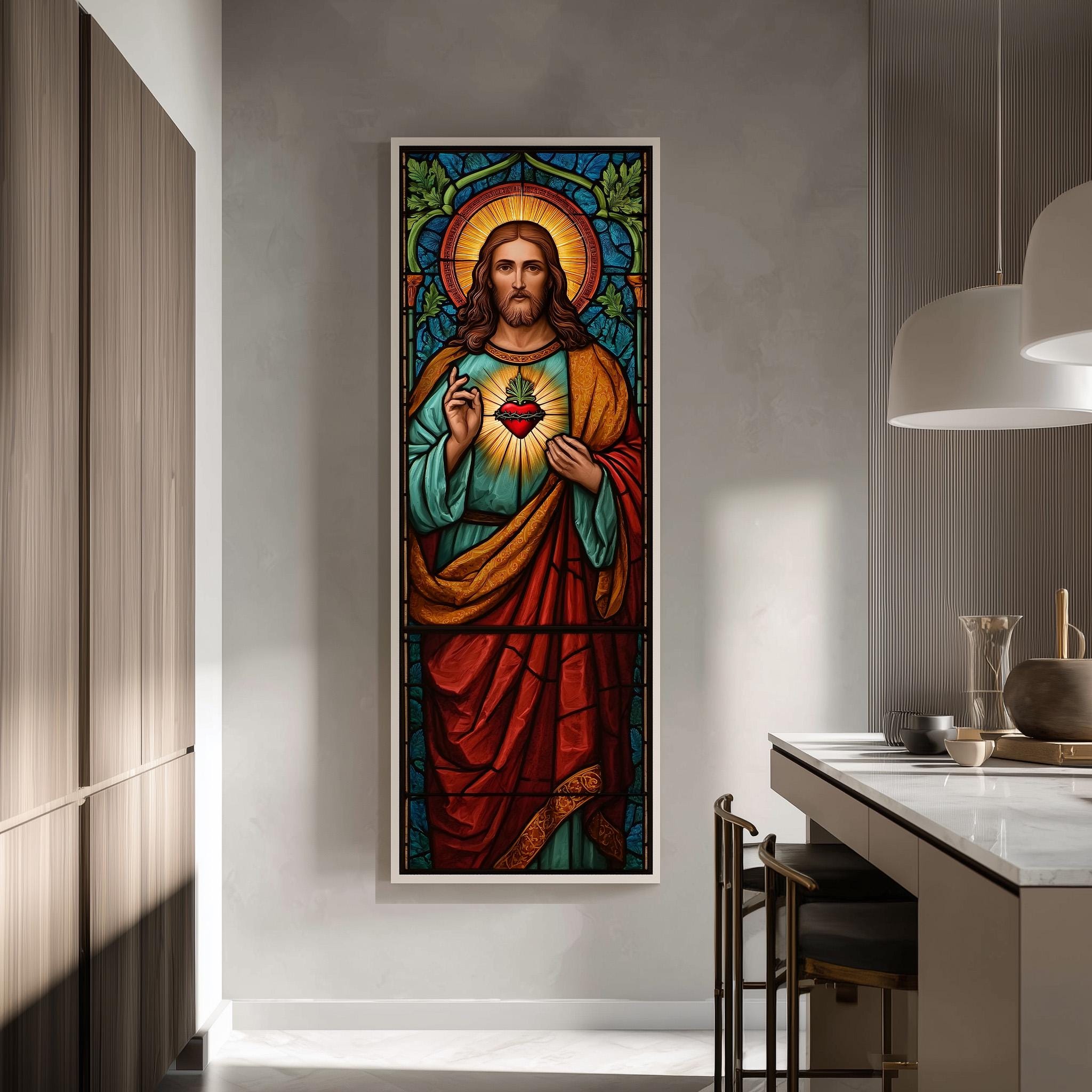 a large, colorful painting of Jesus Christ, with a stained glass-like design and a prominent heart in his chest. The painting is mounted on a wall in a room with a kitchen counter and chairs visible in the background.
