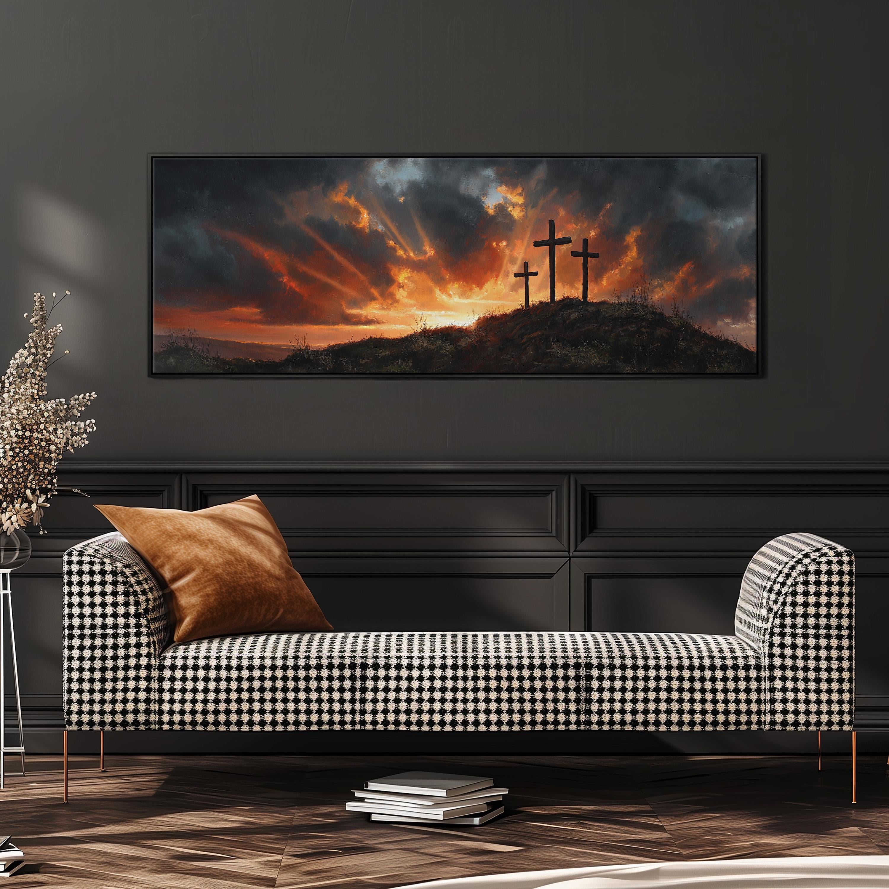 a large black and white checkered sofa with a brown throw pillow, set against a dark wall with a framed painting of three crosses silhouetted against a dramatic sunset sky.