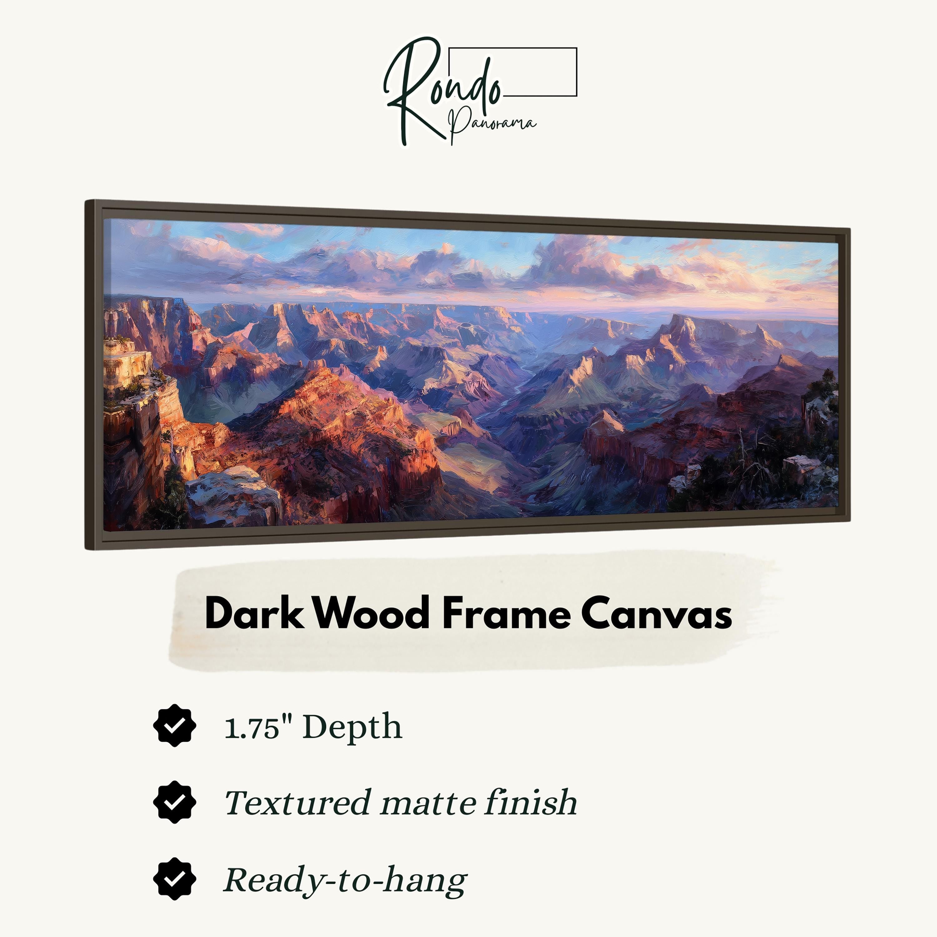 The image is a framed canvas depicting a scenic landscape with mountains and a sunset sky.