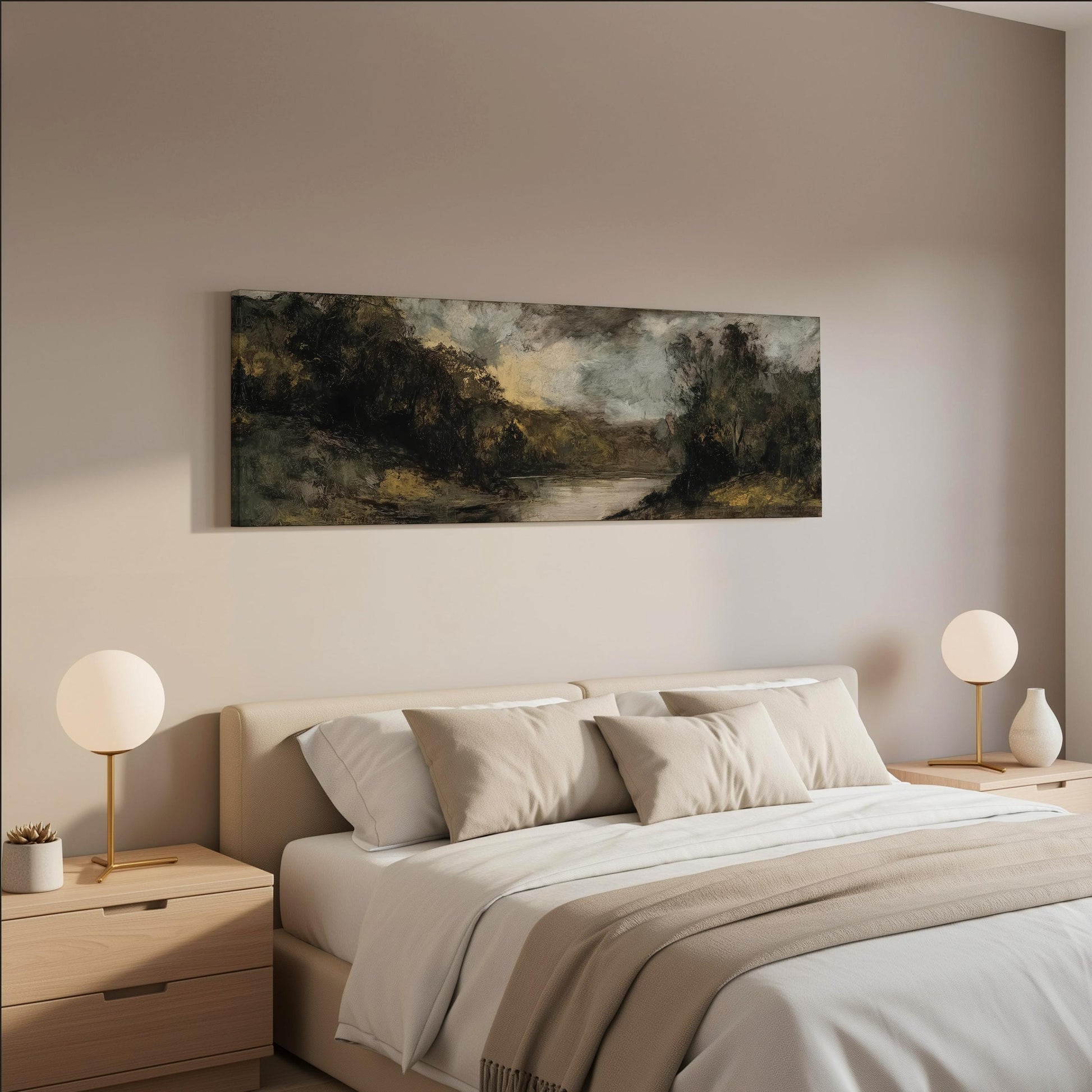 a serene bedroom scene with a large bed adorned with white linens and beige throw pillows. Above the bed, a painting of a landscape with a river and trees is displayed on the wall. The room is decorated with two round table lamps on nightstands, and the overall color scheme is neutral, creating a calm and peaceful atmosphere.