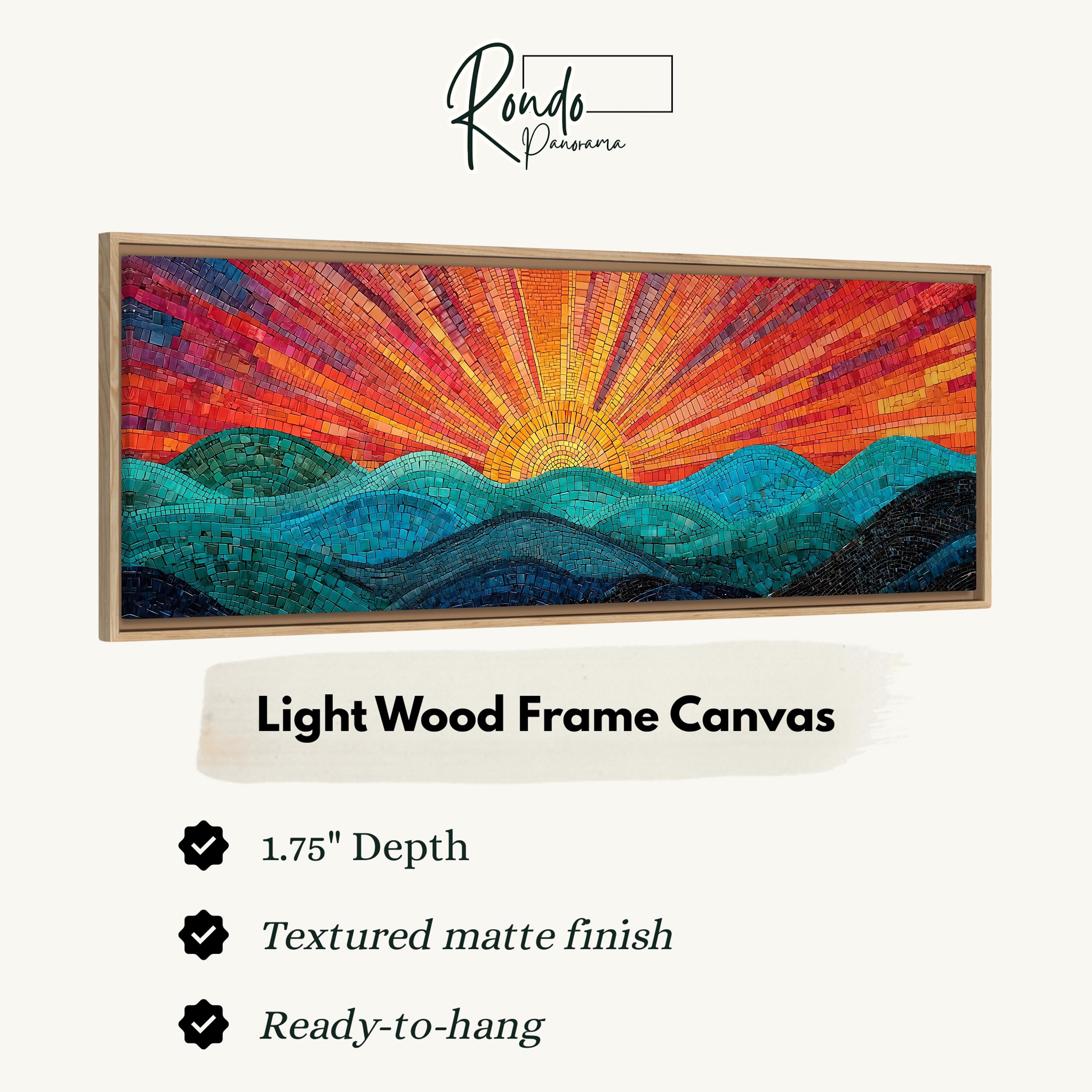 The image is a framed artwork depicting a vibrant, colorful landscape with a sunburst pattern. The frame is described as a light wood frame canvas, which is 1.75" deep and has a textured matte finish. It is ready to hang.
