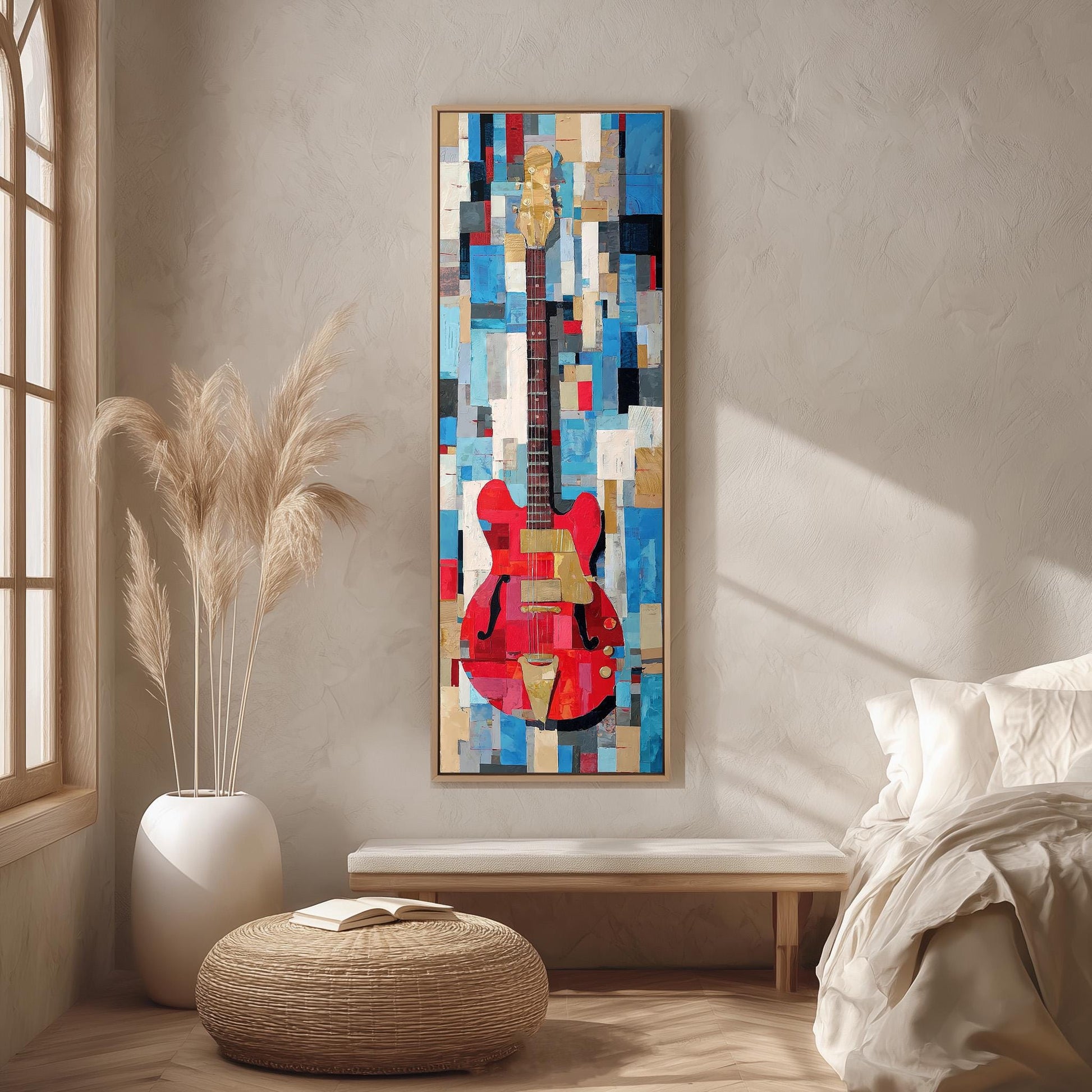 a large abstract painting of a guitar hanging on a wall in a room with a bed, a wicker ottoman, and a potted plant.