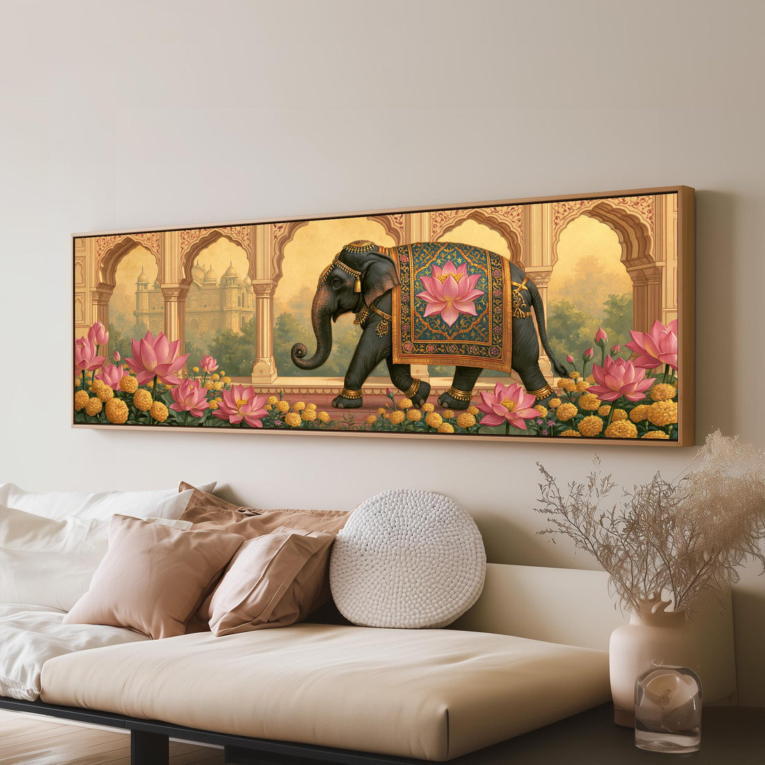 Royal elephant beneath palace arches long horizontal canvas print above a sofa in a living room