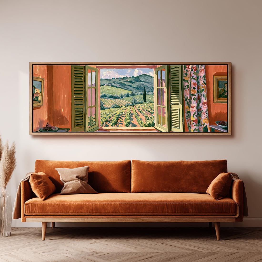 Tuscan vineyard hills through an orange room window long horizontal canvas print above a sofa in a living room