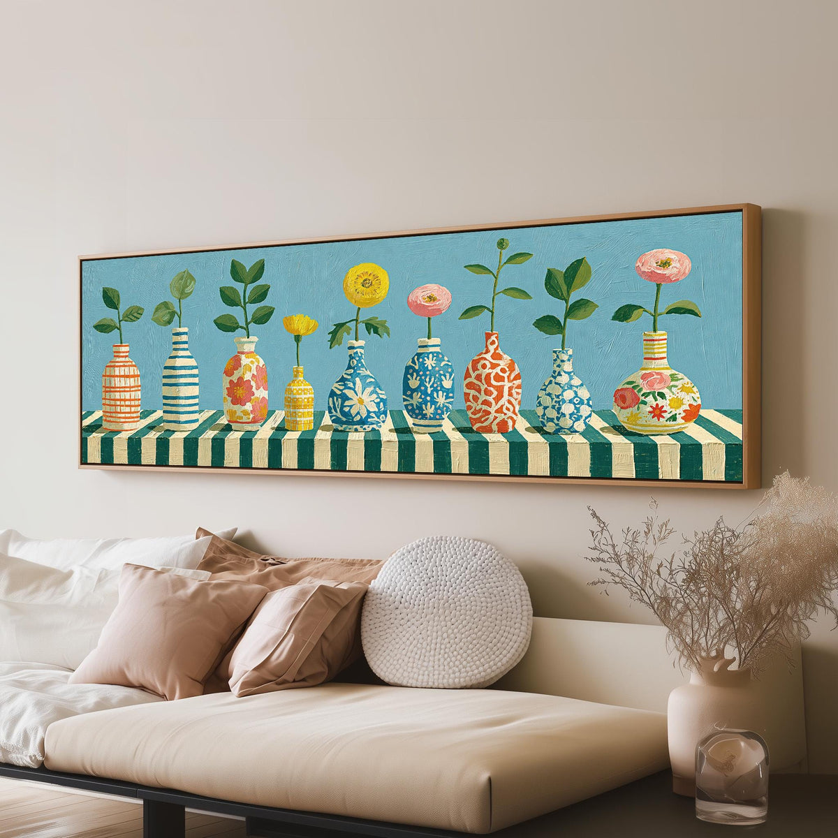 Row of striped vases with flowers panoramic canvas print above a sofa in a living room