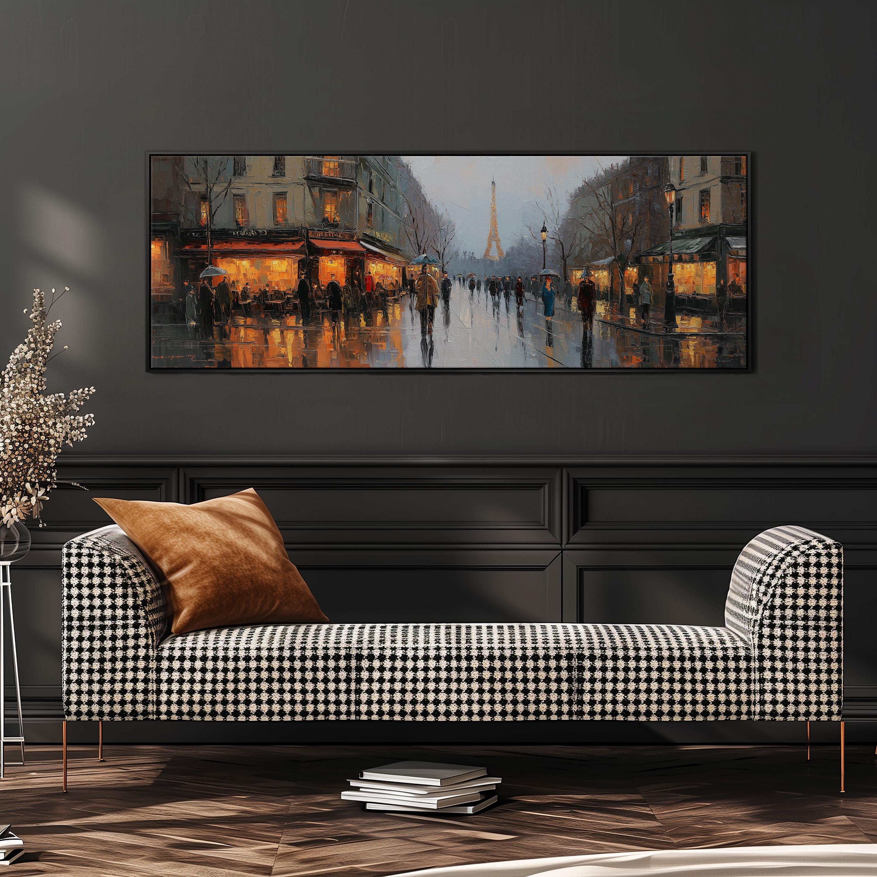 a large painting of a city street scene with people walking on the sidewalk, illuminated by streetlights and building lights. The painting is hung on a wall above a black and white checkered sofa, which is positioned in front of a stack of books.