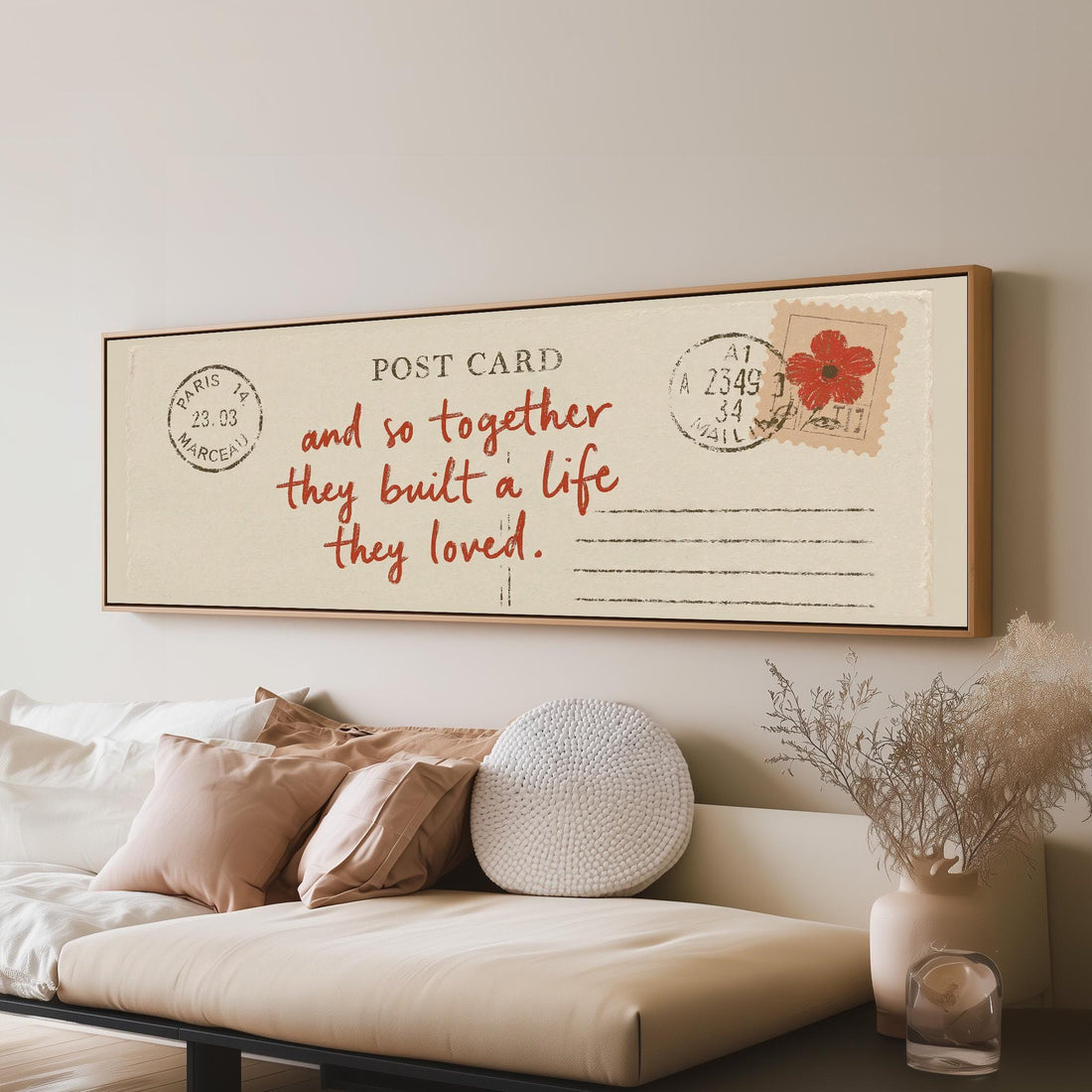 Paris postcard saying and so together they built a life they loved long horizontal canvas print above a sofa in a living room