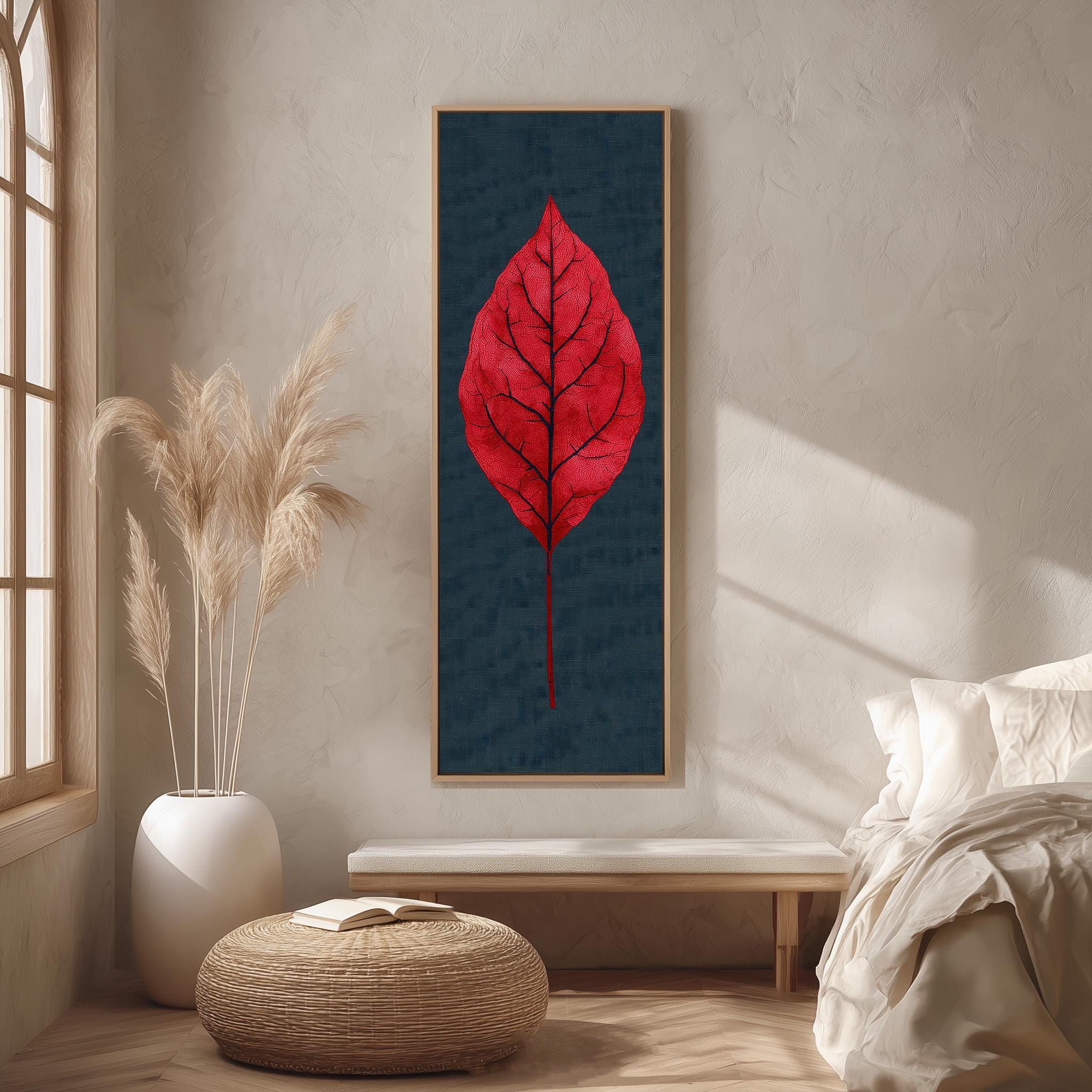 a large, red leaf on a blue background, hanging on a wall in a minimalist bedroom setting.