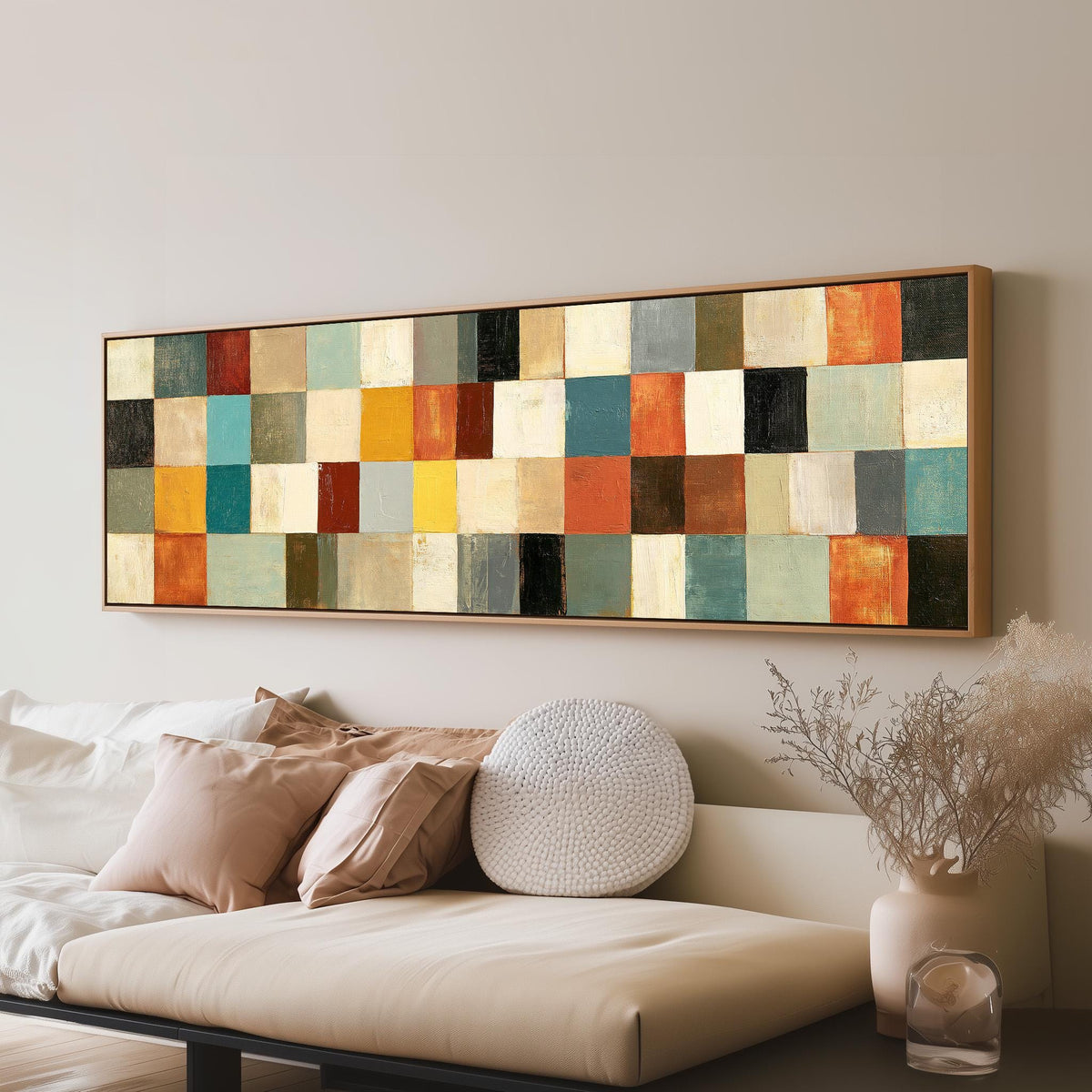 Colorful checkerboard mosaic grid panoramic canvas print above a sofa in a living room